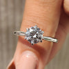 Elegant round solitaire engagement ring featuring a classic design for timeless beauty and sophistication.
