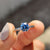 Royal blue ring in a white gold setting.