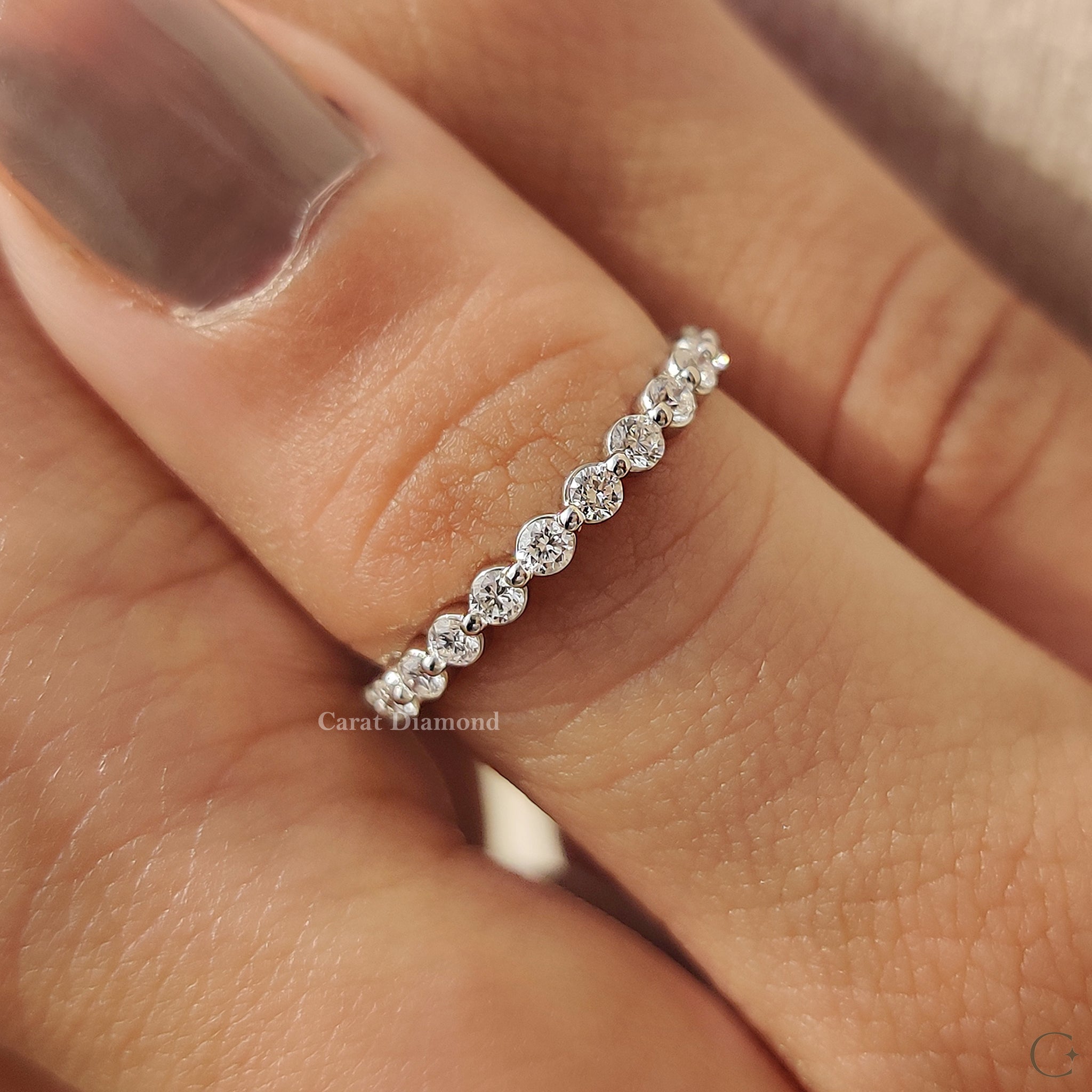 Lab grown diamond ring set in a timeless wedding band.
