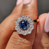 Blue round old European cut ring in prong setting for a stunning vintage-inspired look.

