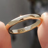 Carat diamonds wedding band pairs with yellow gold wedding band.