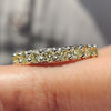Handmade jewelry featuring round moissanite and bright color.