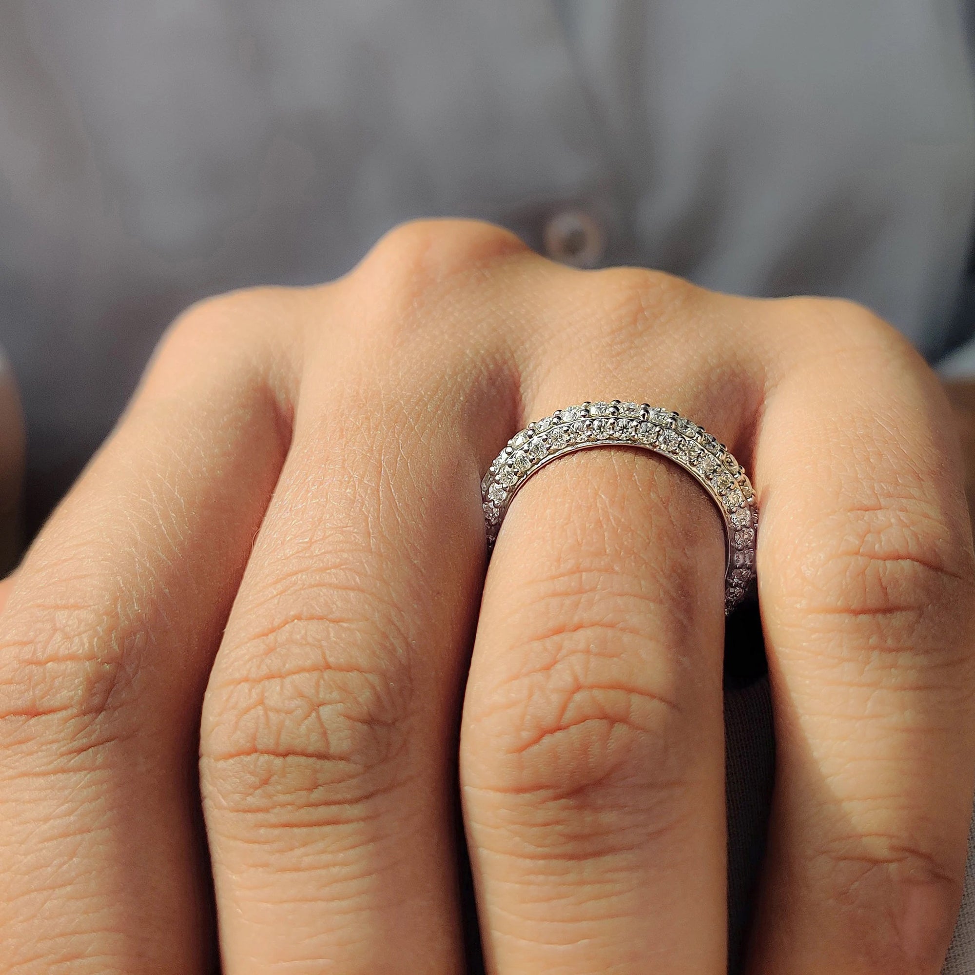 Buy a Moissanite band that suits your taste.
