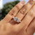 Emerald cut ring featuring three stone engagement ring