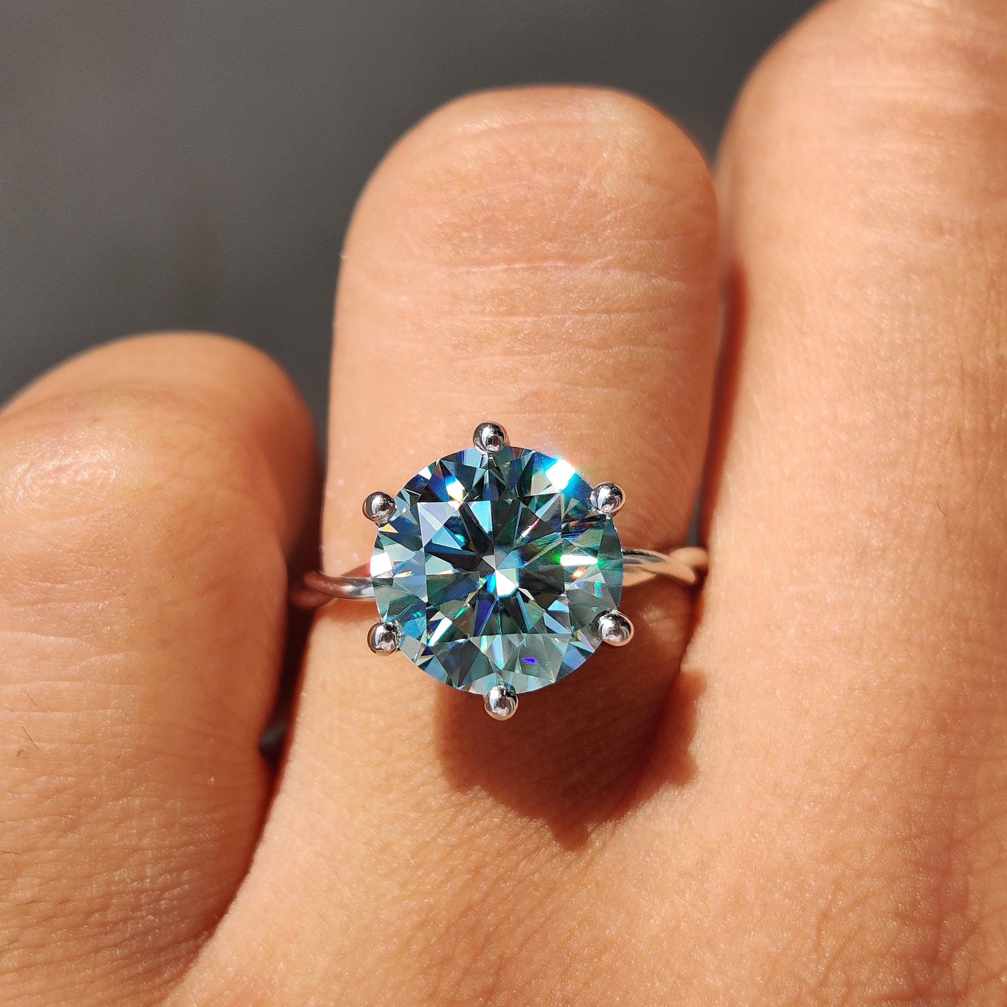 Special gifts for her include bright moissanite in unique settings.
