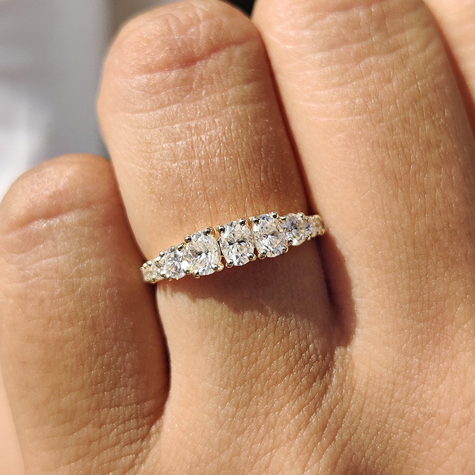 Half Eternity Oval Cut Diamond Band