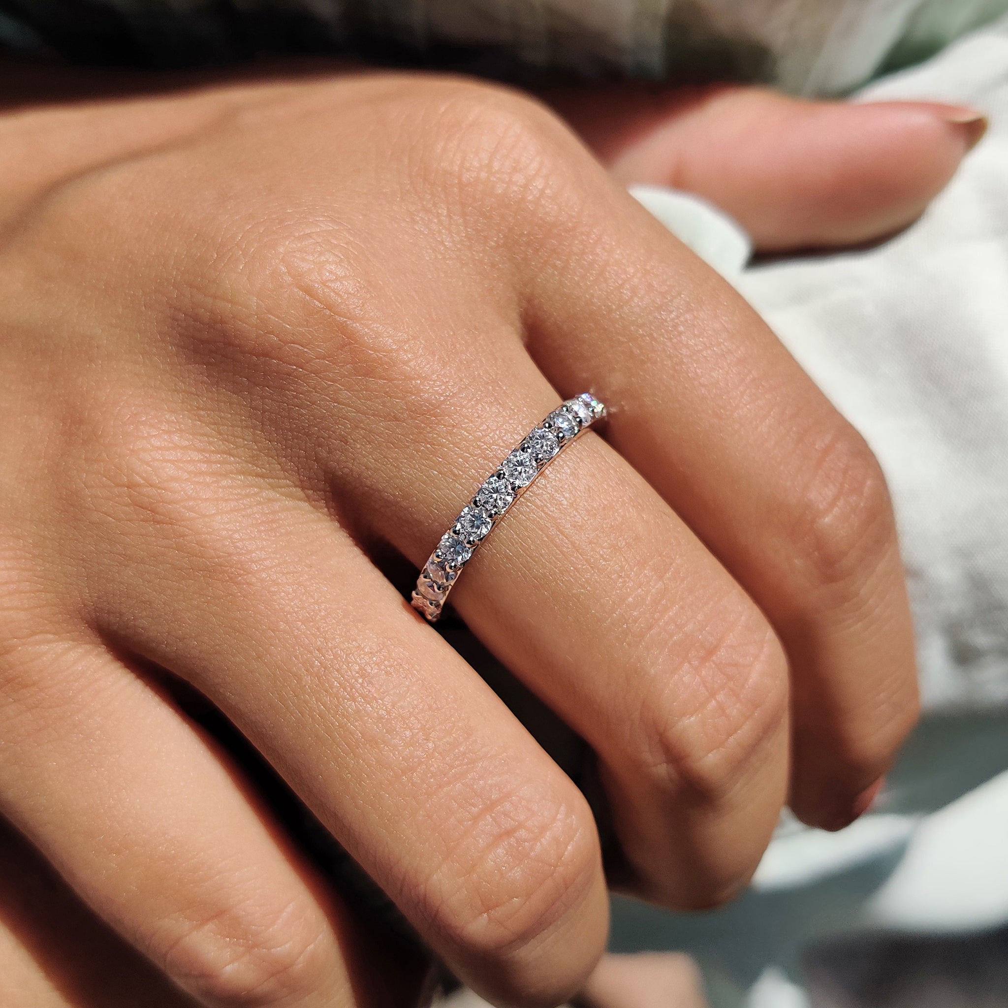 Round cut wedding band with moissanite wedding band.