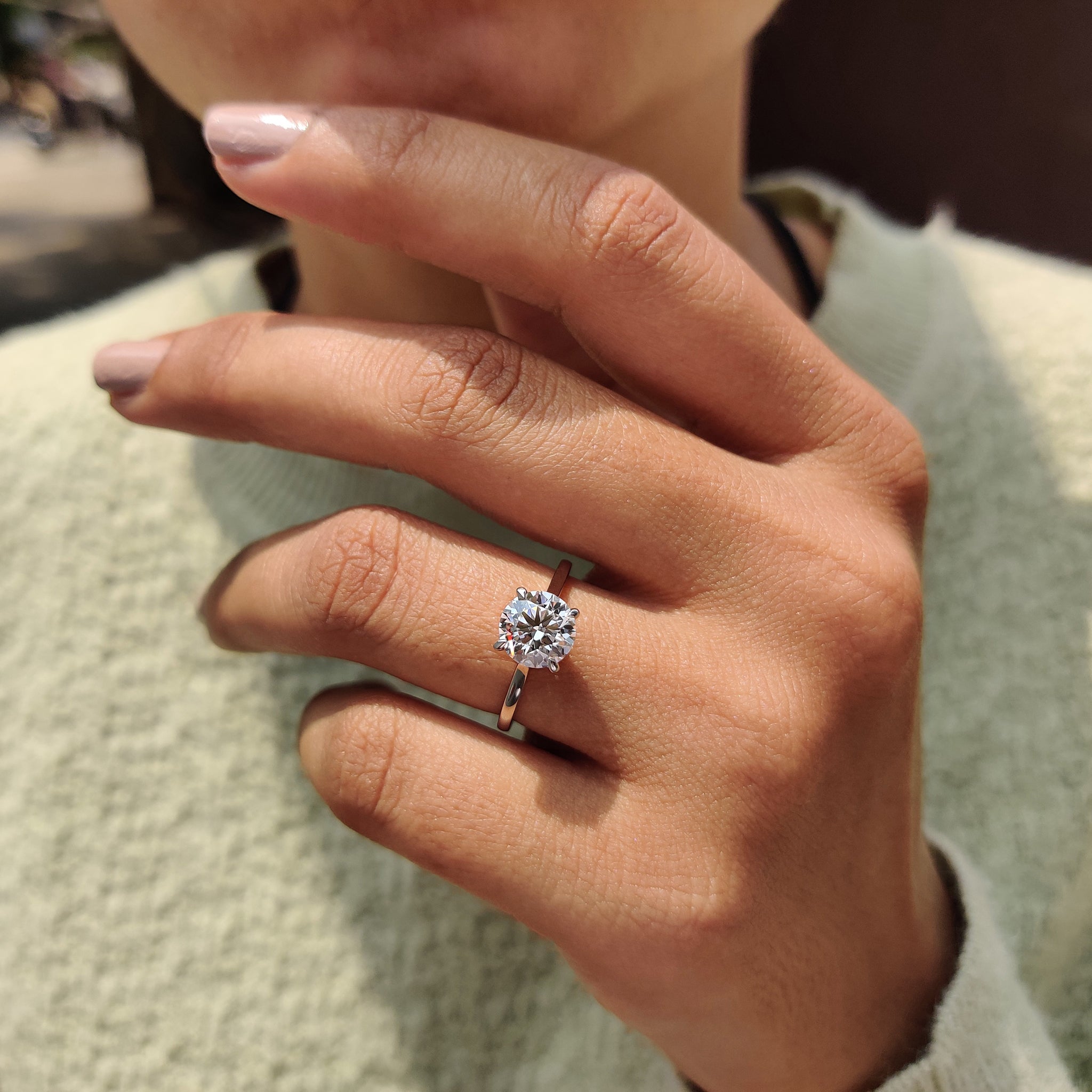 Exquisite handmade jewelry featuring a round solitaire diamond.
