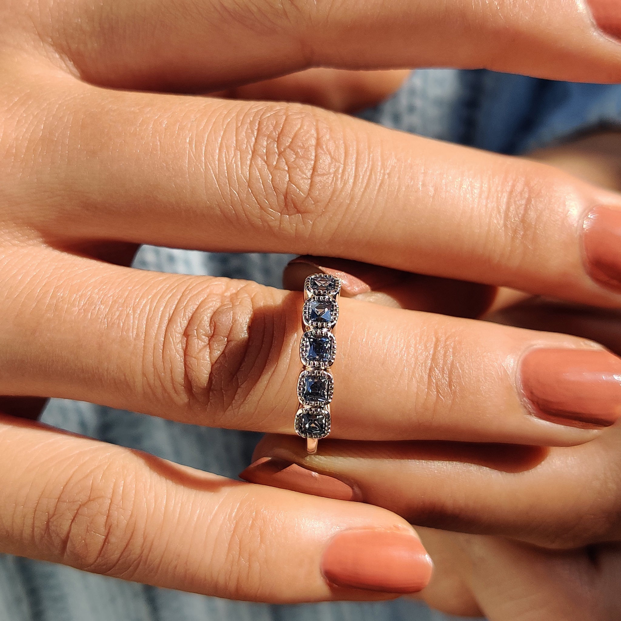 Half eternity wedding band with French cut and milgrain bezel setting.