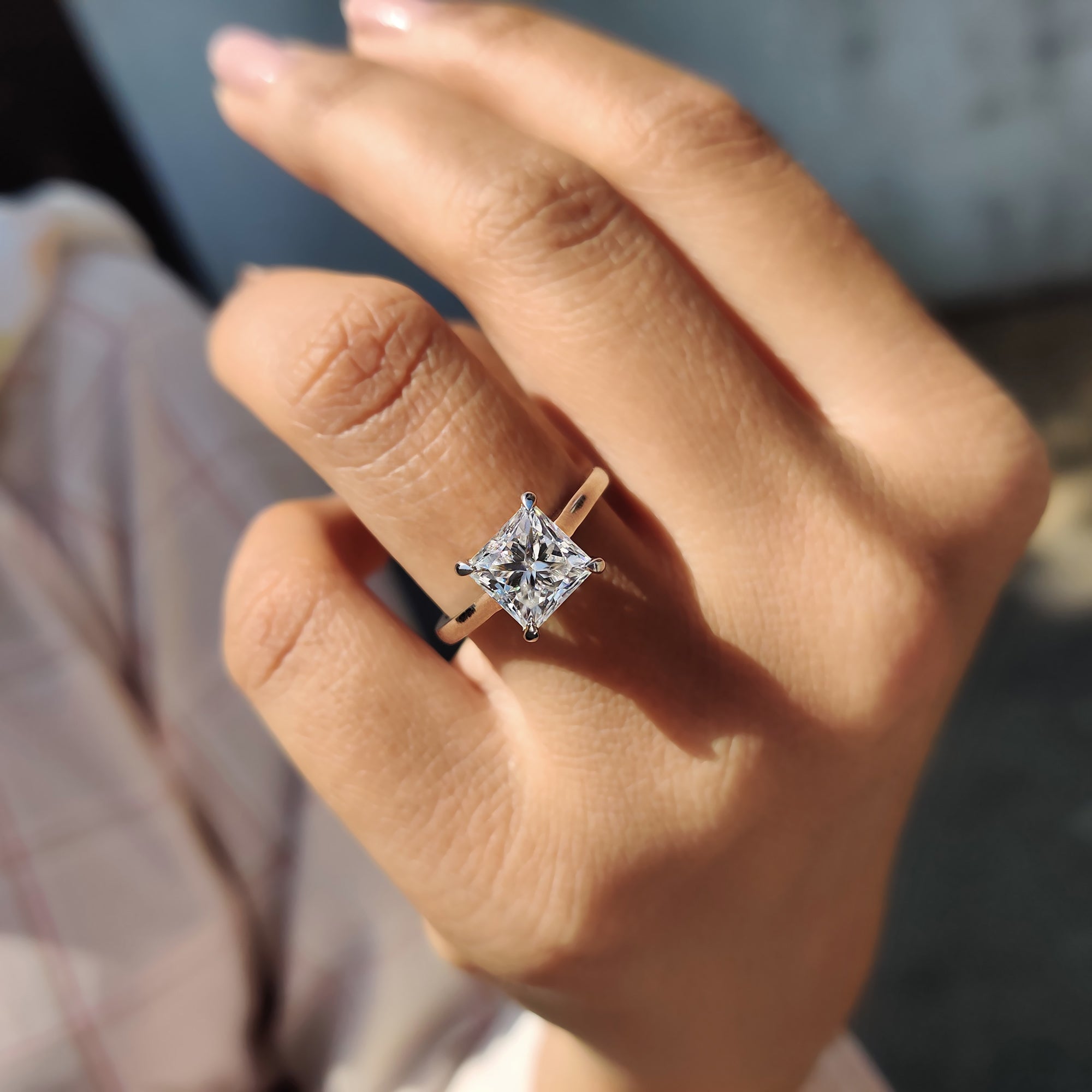 Best engagement ring option with princess cut Moissanite and a sleek solitaire setting.
