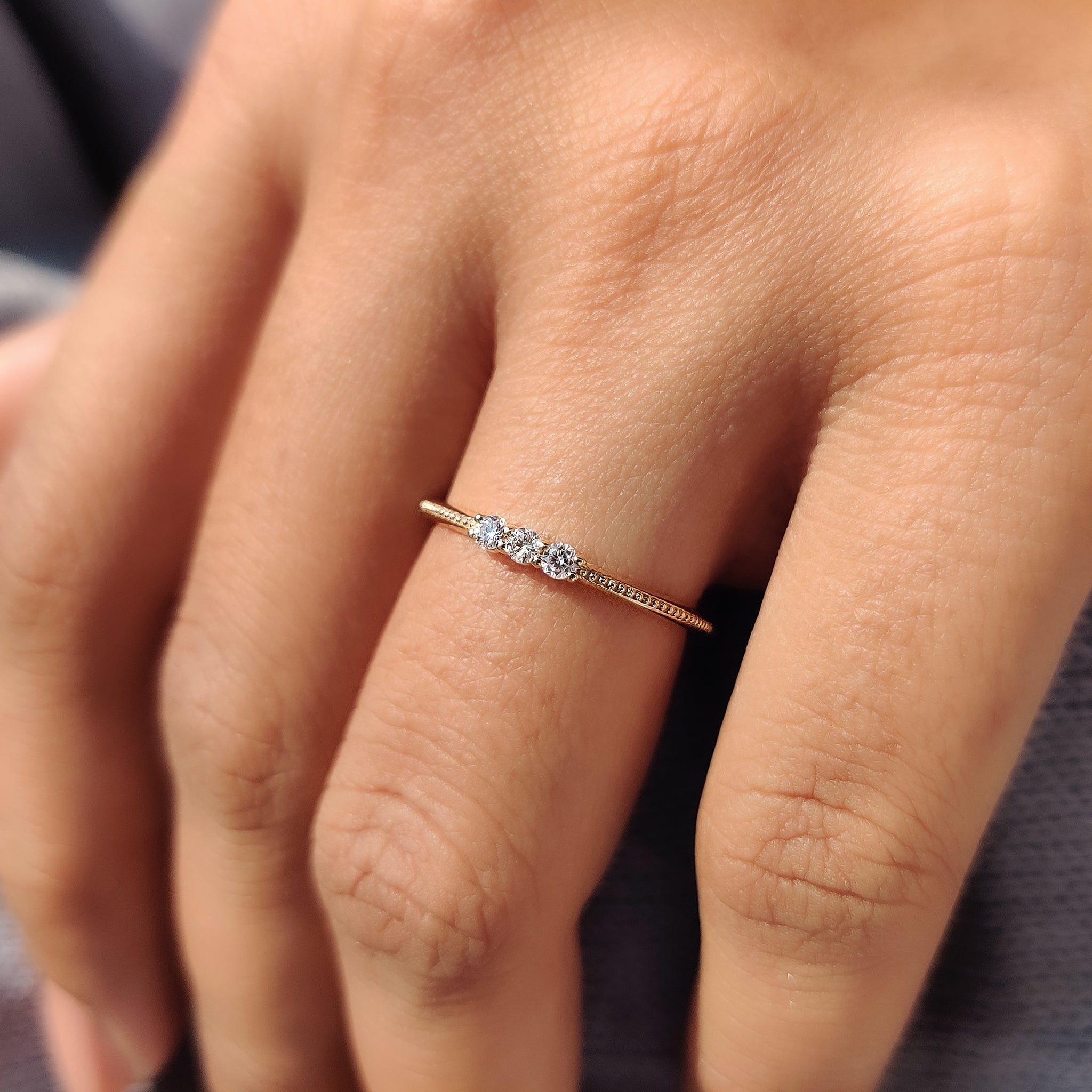 Prong setting diamond band showcasing brilliance and sparkle.
