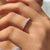 Elegant round diamond band in white gold.