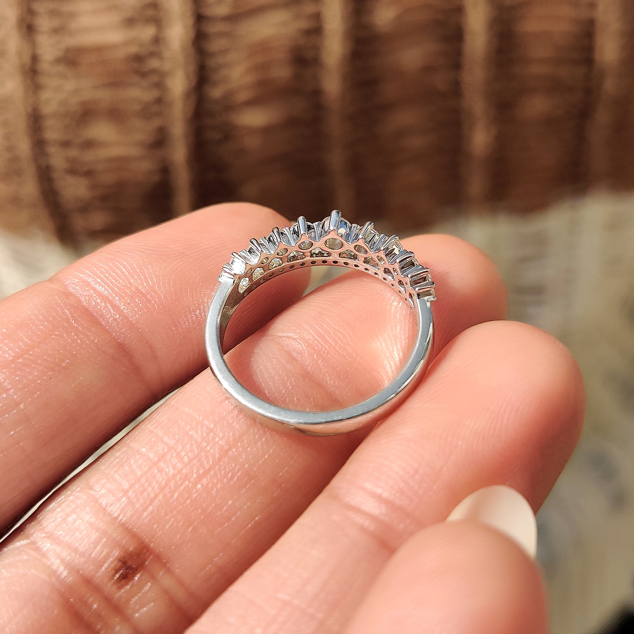 Carat diamonds band photographed in natural lighting.

