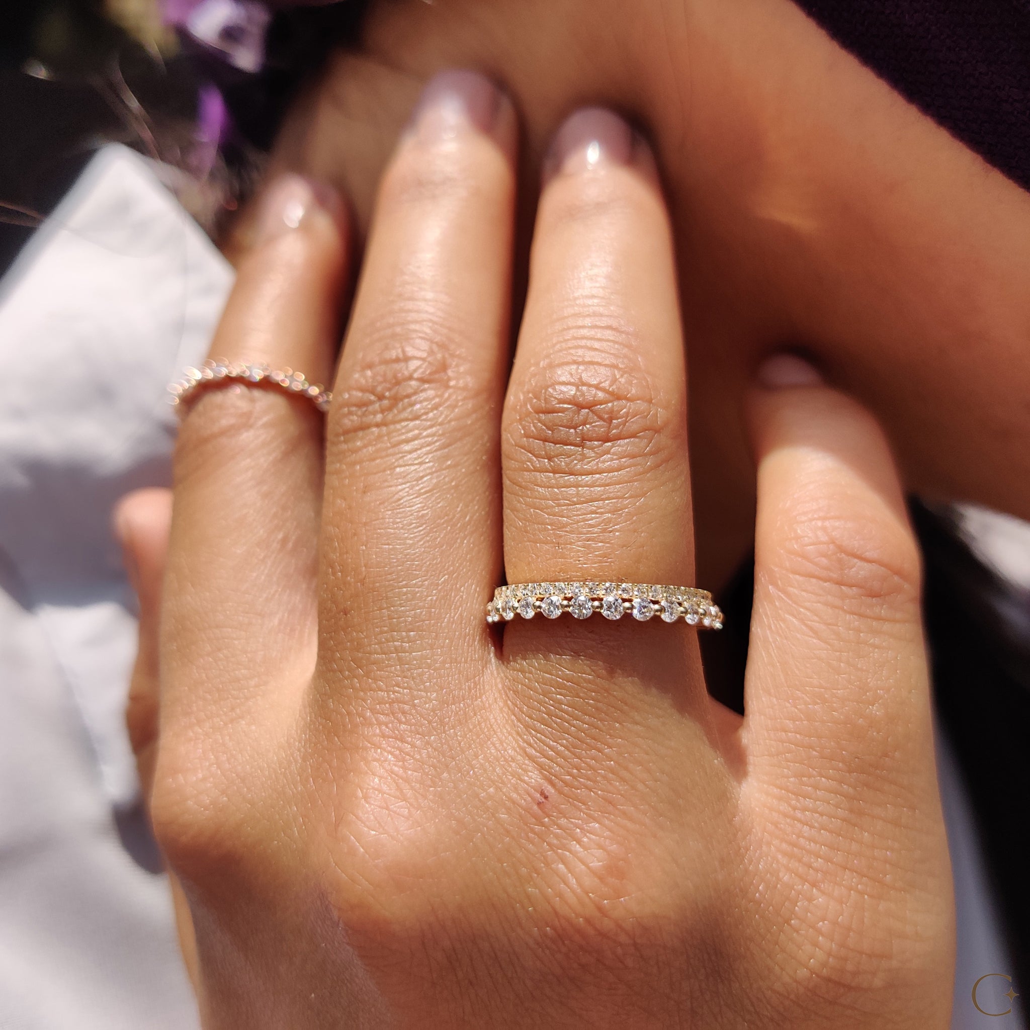 IGI Certified Round Diamond placed in a handcrafted setting.
