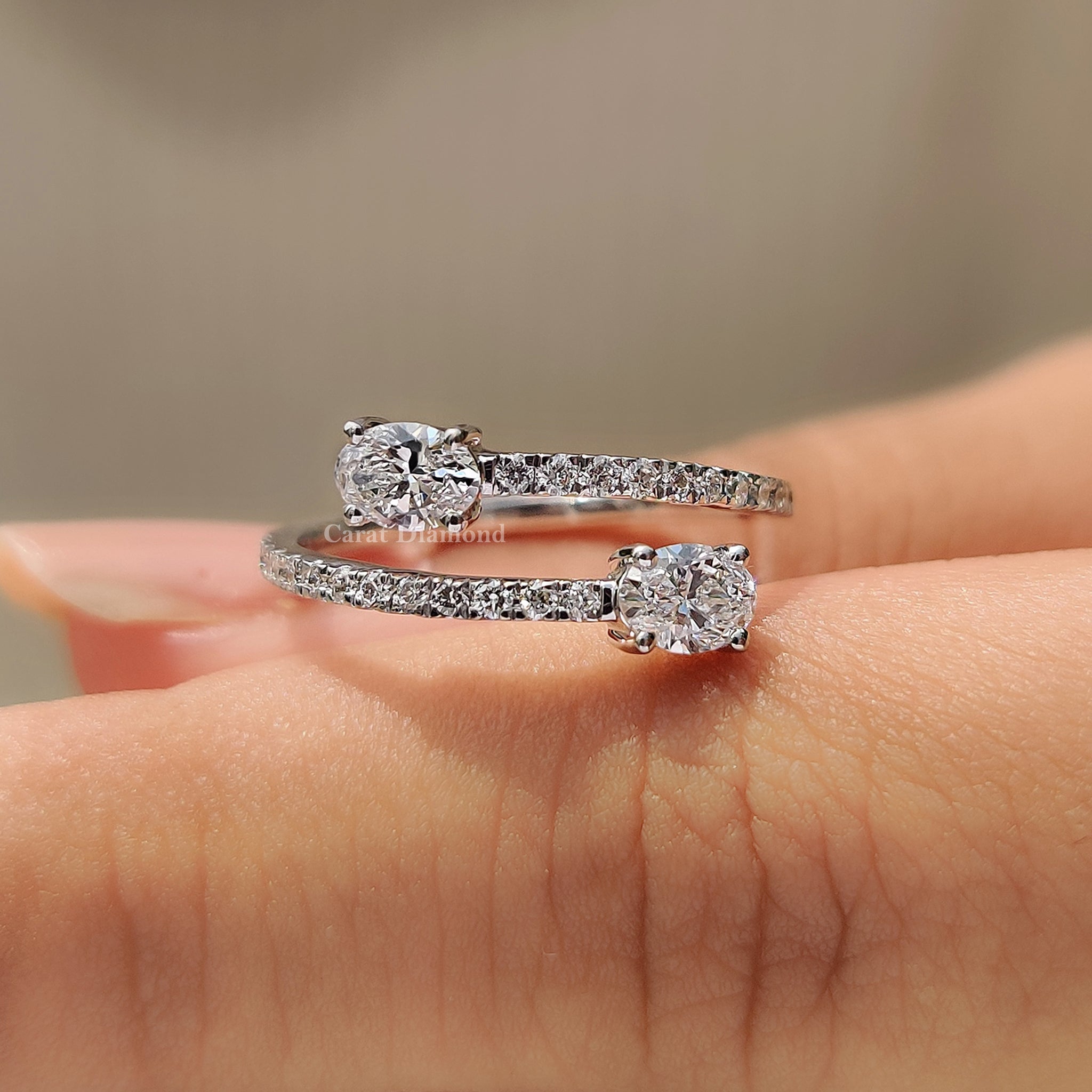 Bypass ring design flows gently around the finger for a bold look.
