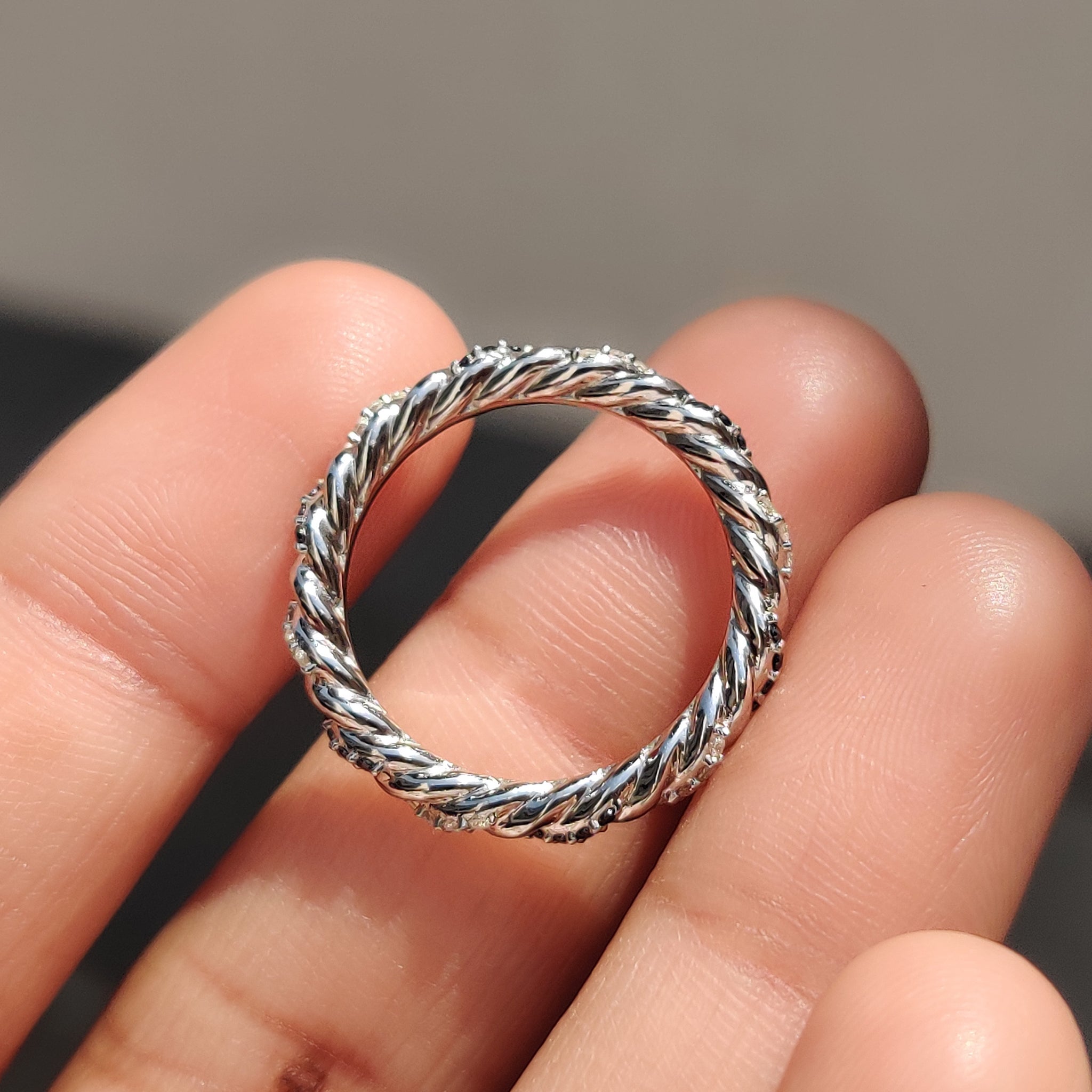 Carat diamonds wedding band with round black moissanite.