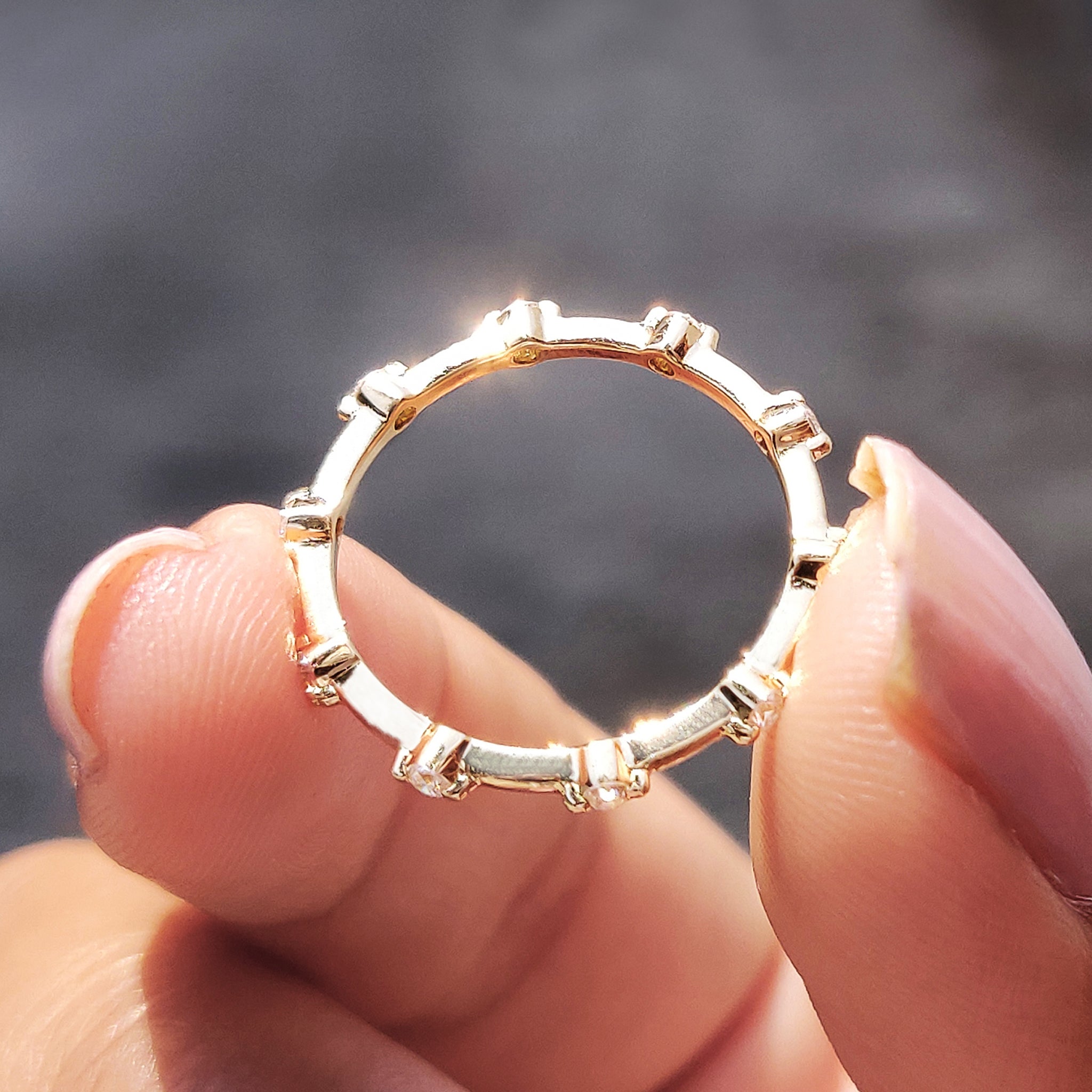 Moissanite wedding band that shines bright.