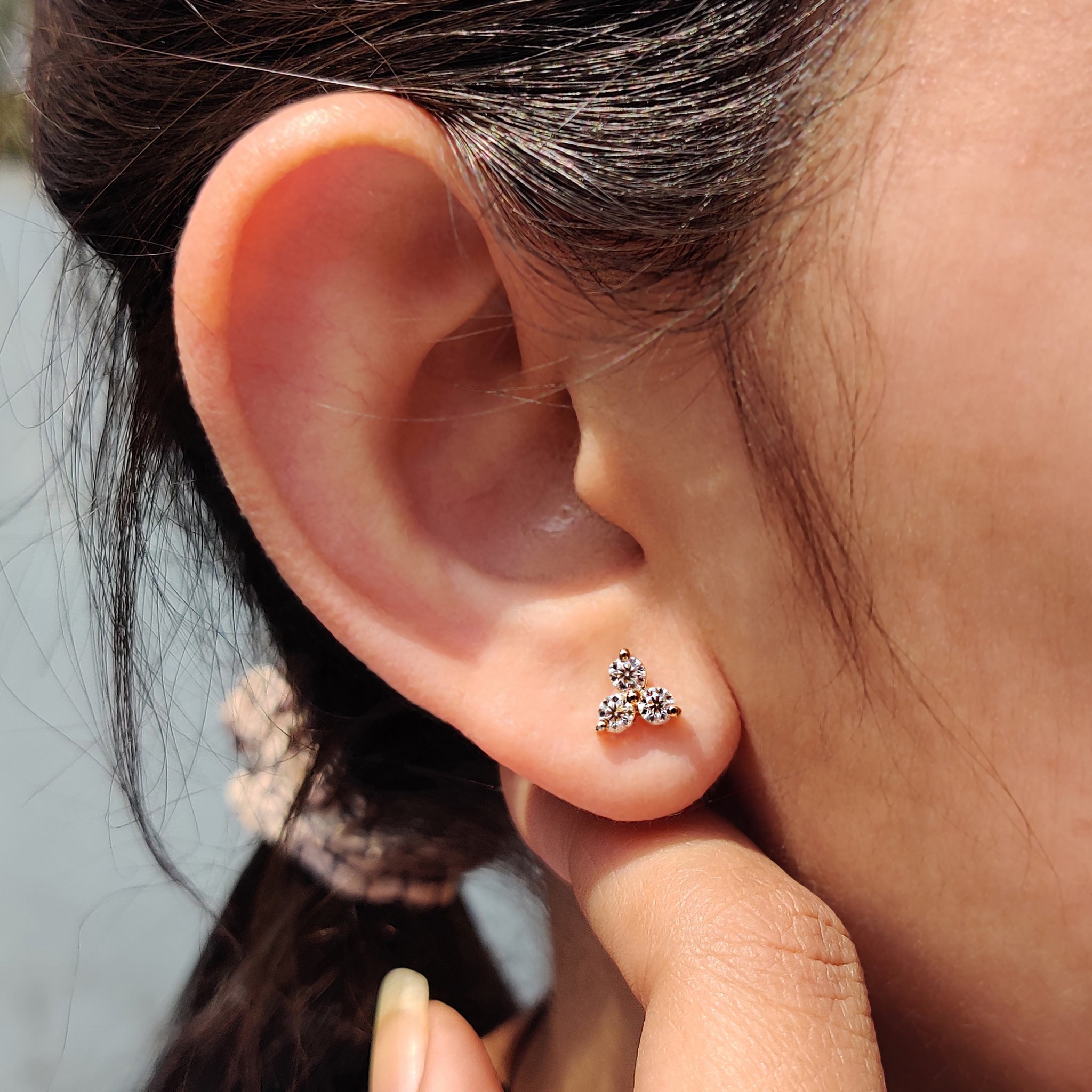 Prong settings earrings securing three stone earrings from carat Diamonds earrings collection.
