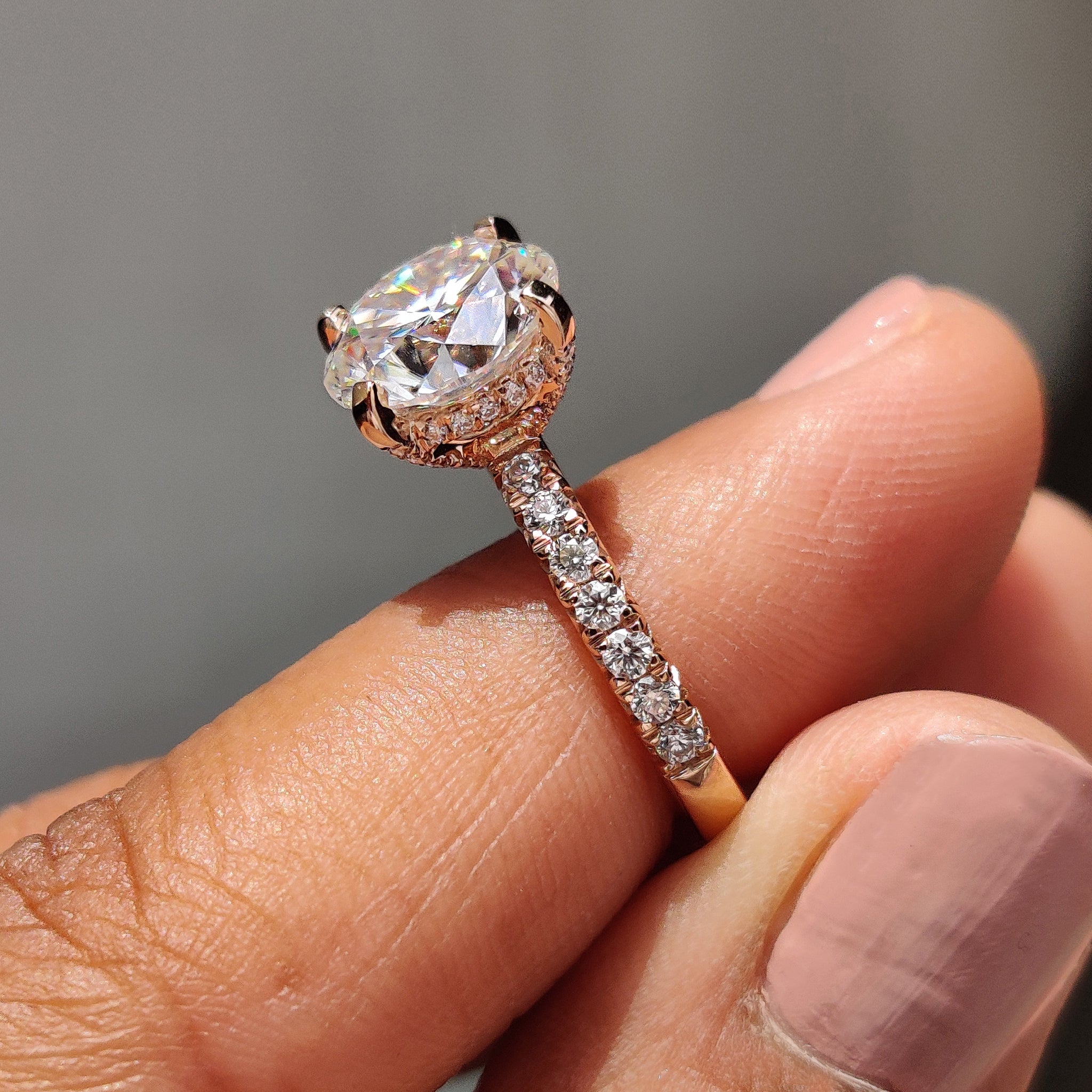 Round cut moissanite ring shines bright with lasting beauty.