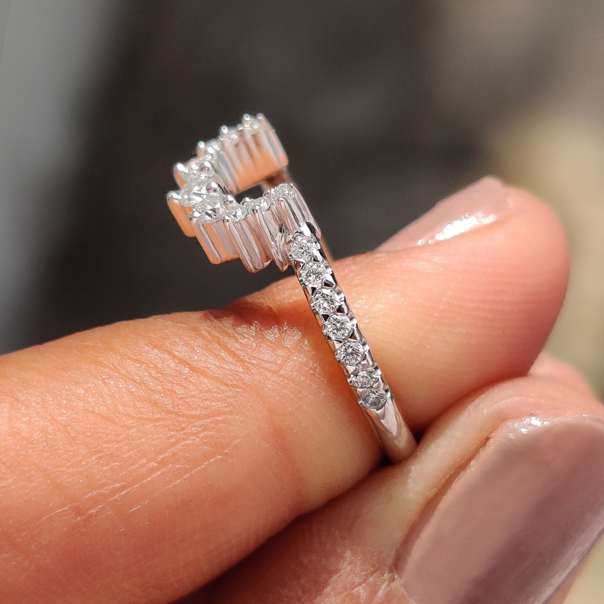 Rose gold band with intricate detailing, designed to be paired with other stackable rings.
