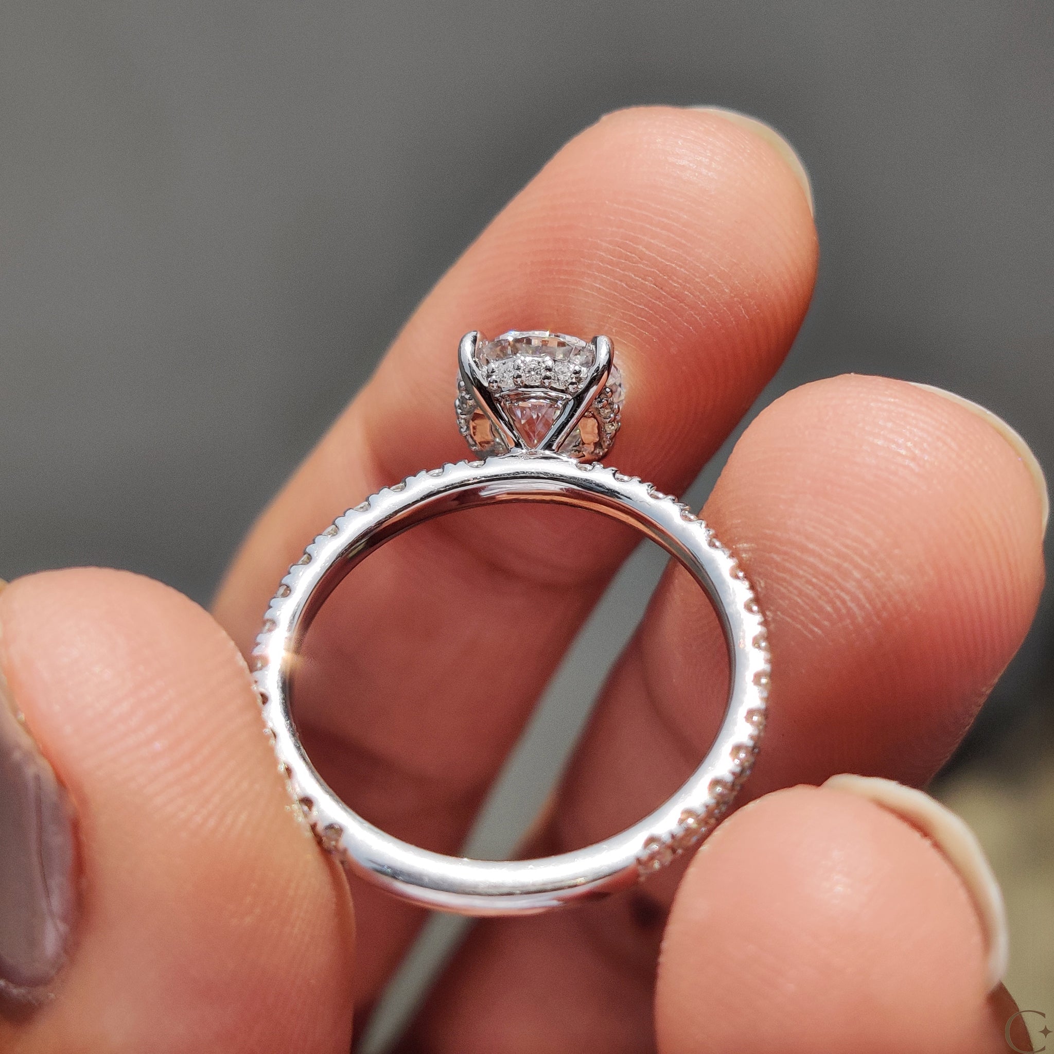 Carat Diamonds engagement ring with a hidden halo design.