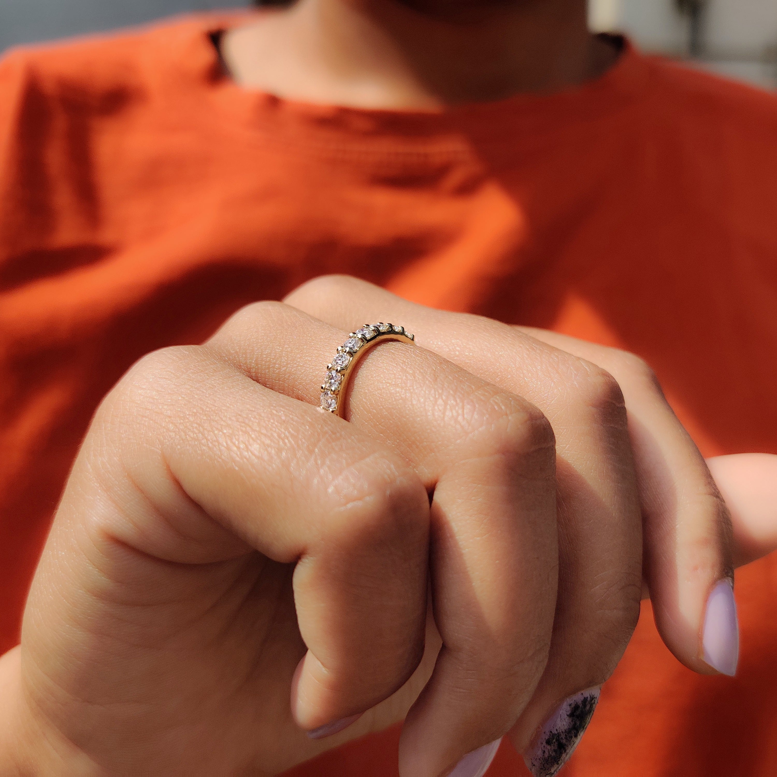 Moissanite wedding band and handmade jewelry.