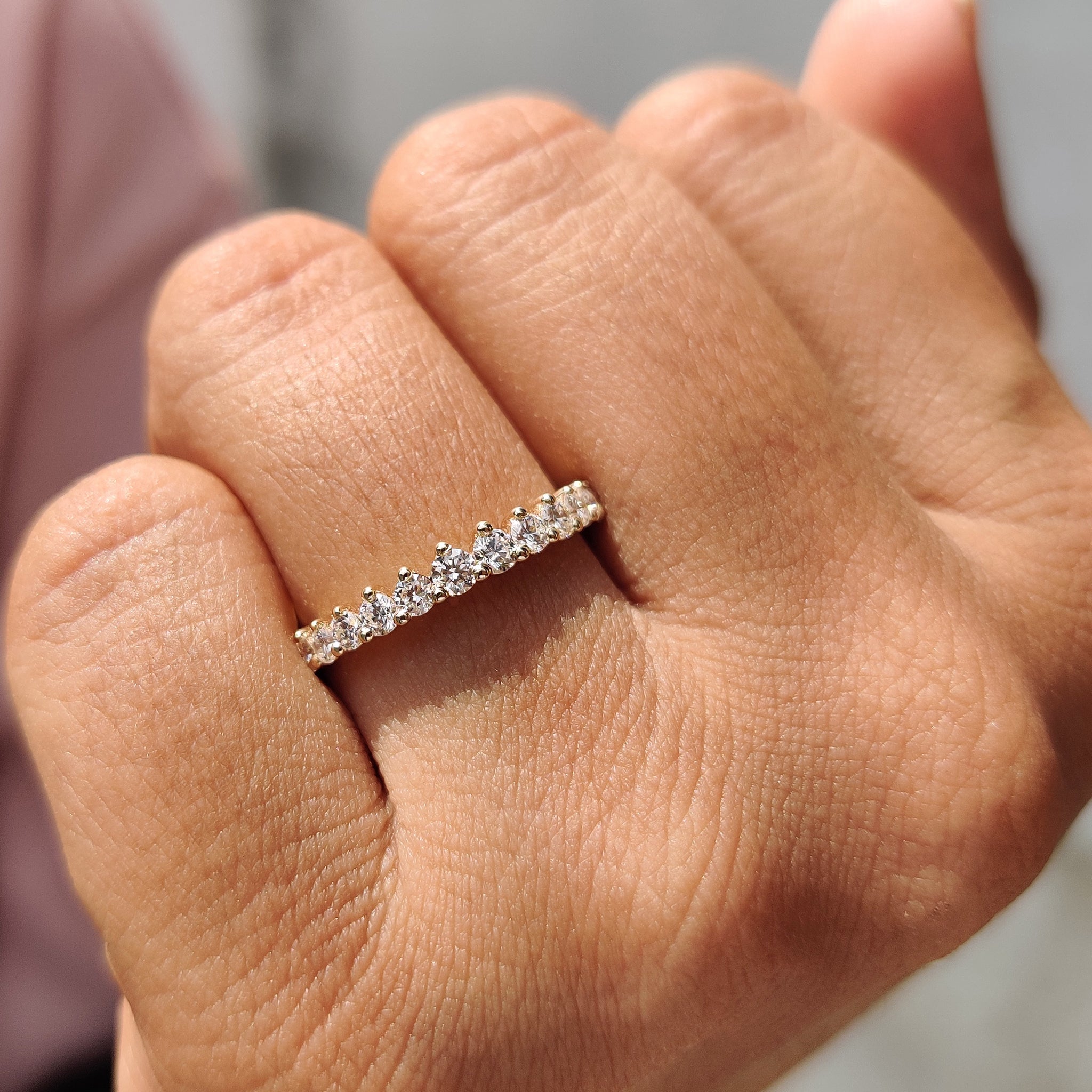 Carat Diamonds wedding band in yellow gold finish.
