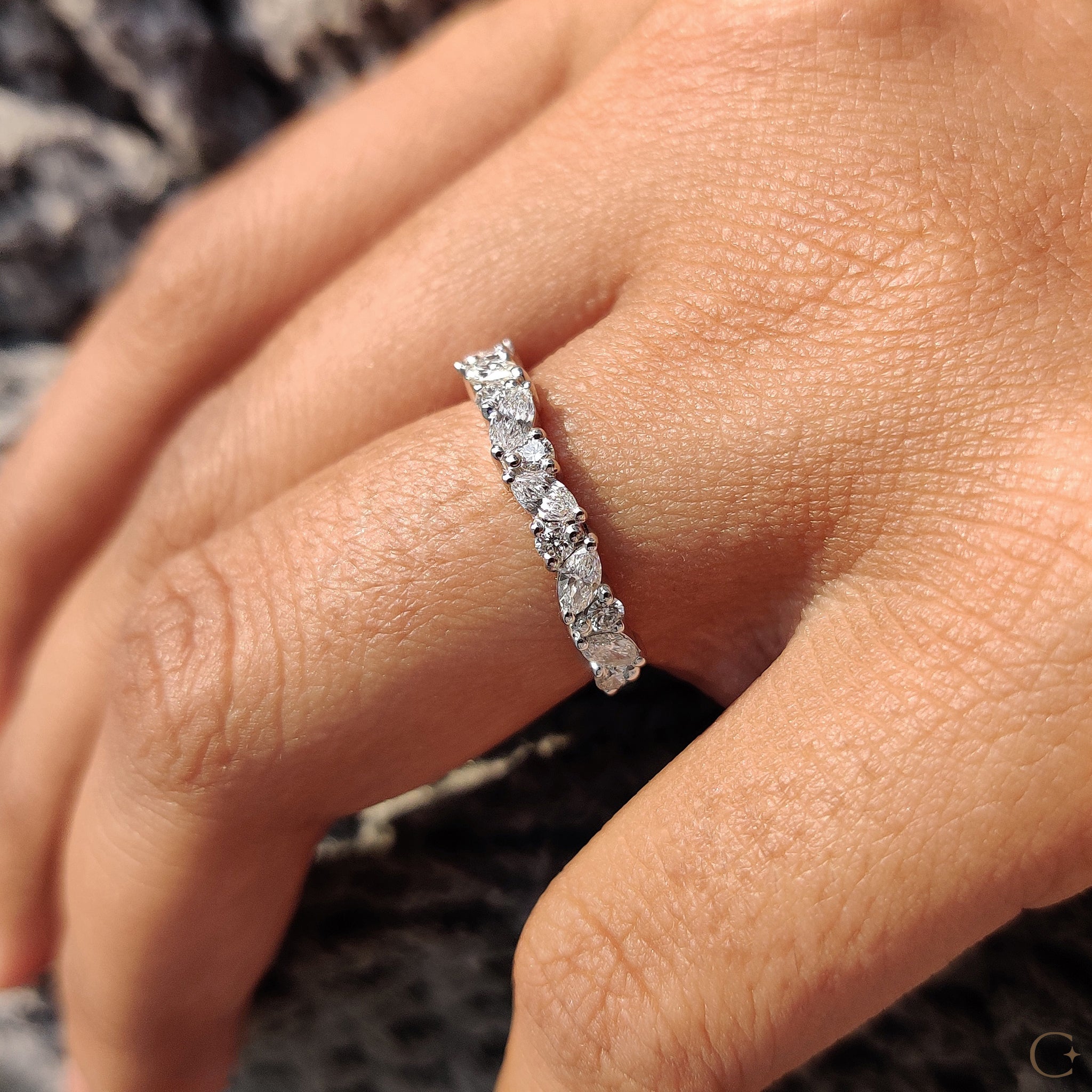 Lab grown diamond band with handmade detailing.
