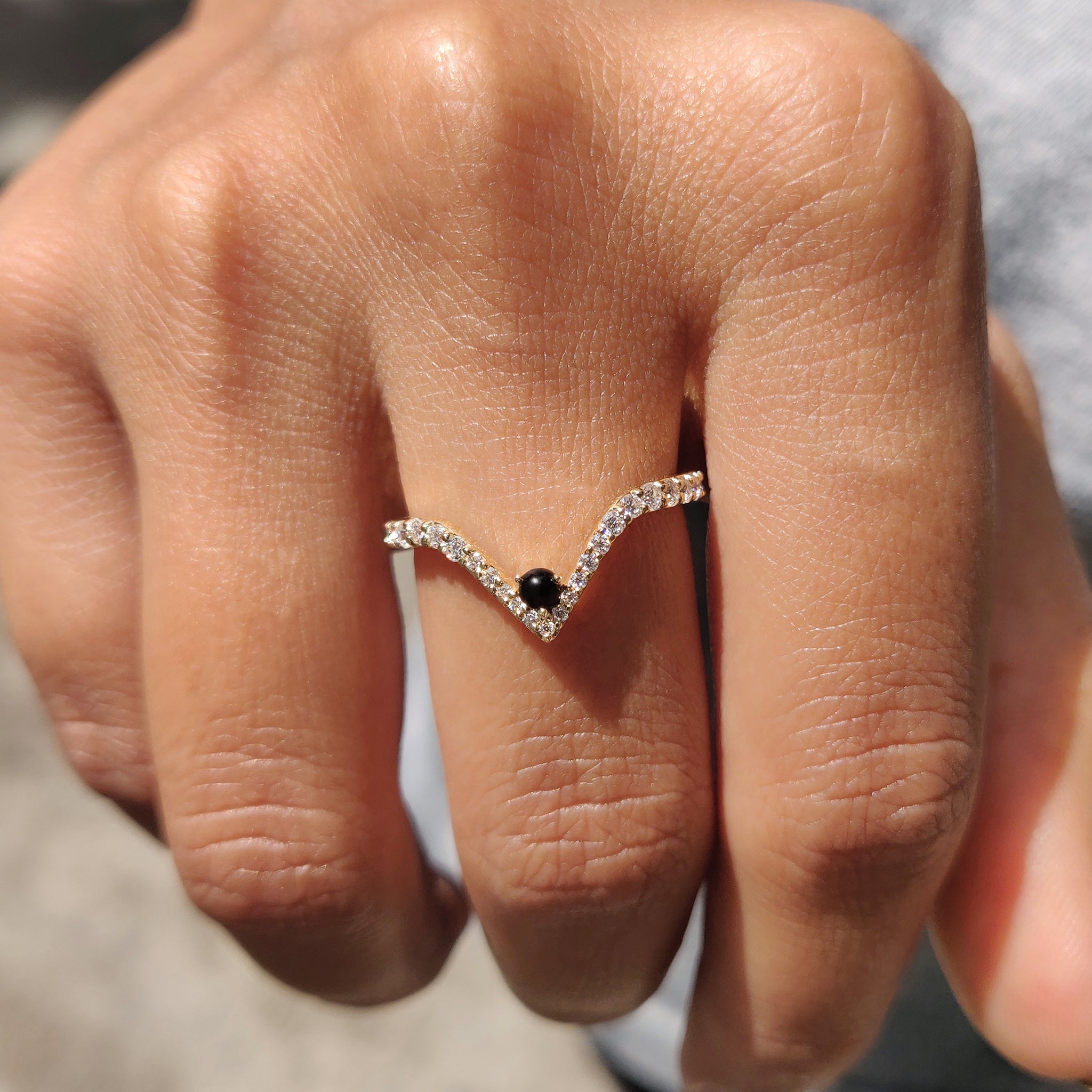 V Shaped Wedding Band in yellow gold with a modern aesthetic.
