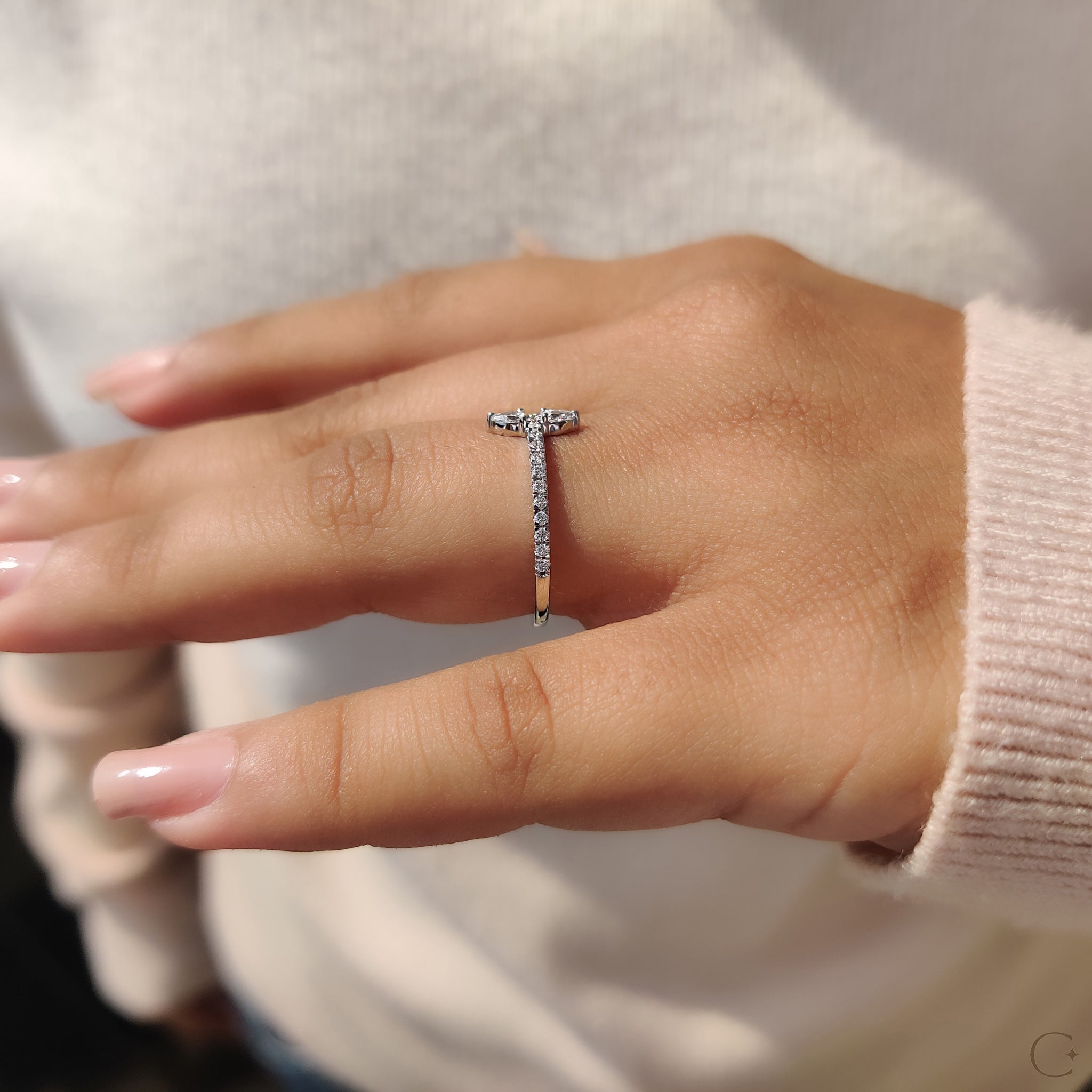 Stunning round cut pave setting on a white gold engagement ring.
