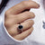 Black Moissanite ring captures bold and rich contrast.