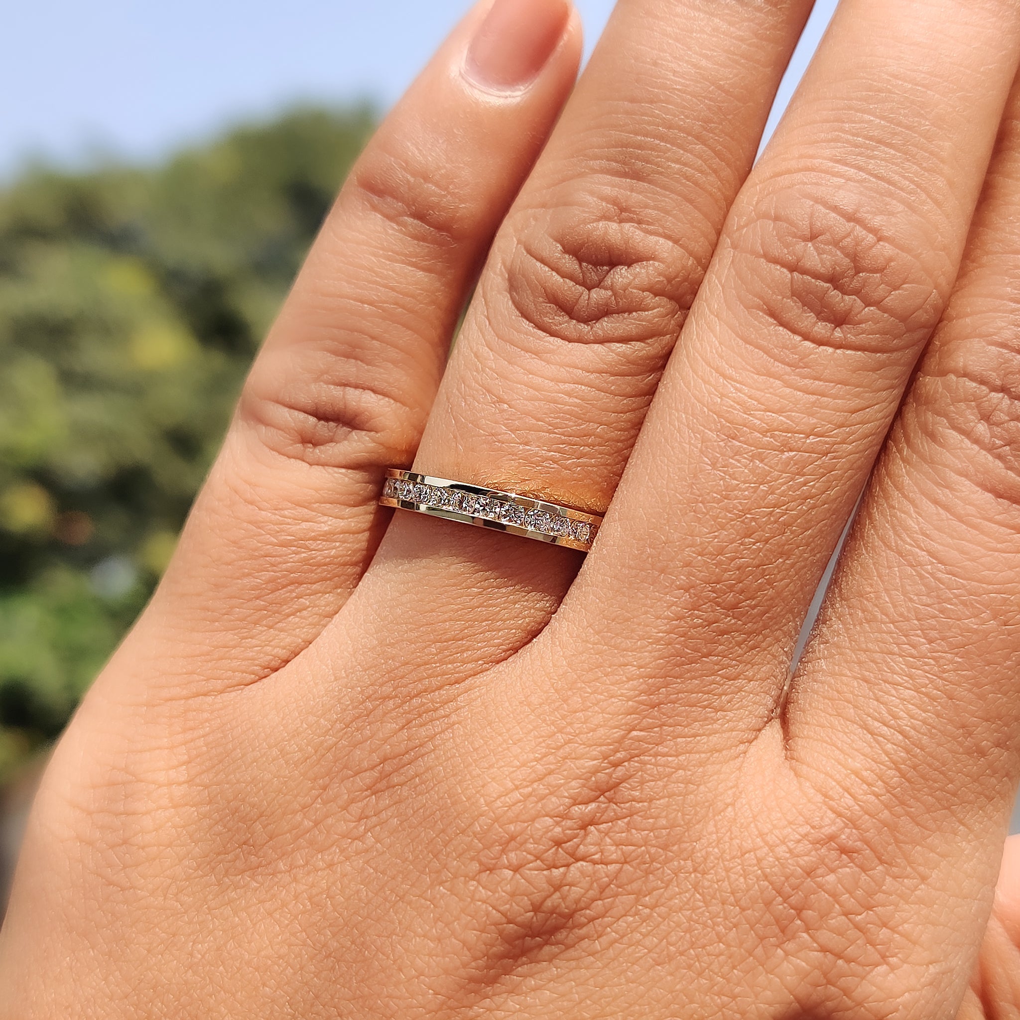 Handmade band featuring a channel set diamond band design for uniqueness.

