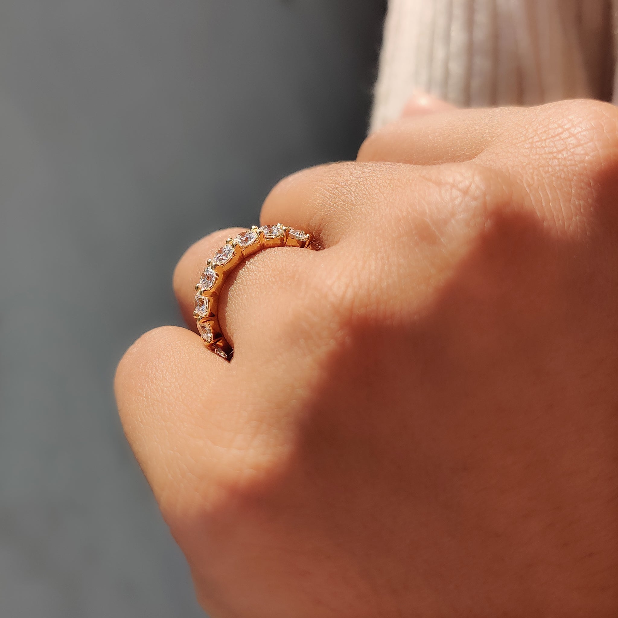 Handmade jewelry band featuring sparkling round diamonds.

