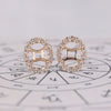 Gemini earrings in rose gold with round cut halo studs.
