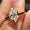 Bezel setting engagement ring with hexagon step cut ring.
