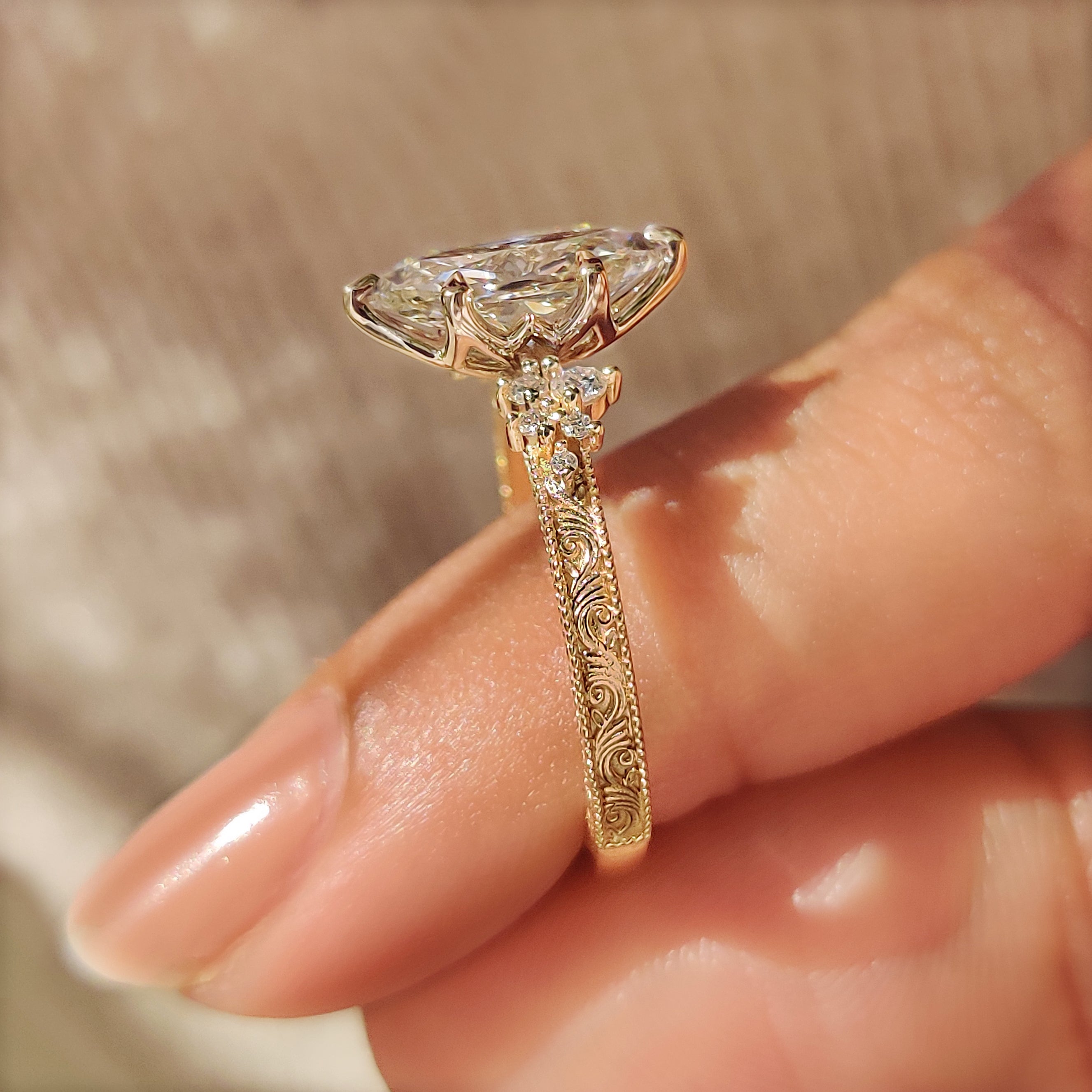 Handmade Dutch marquise diamond ring with muse setting details
