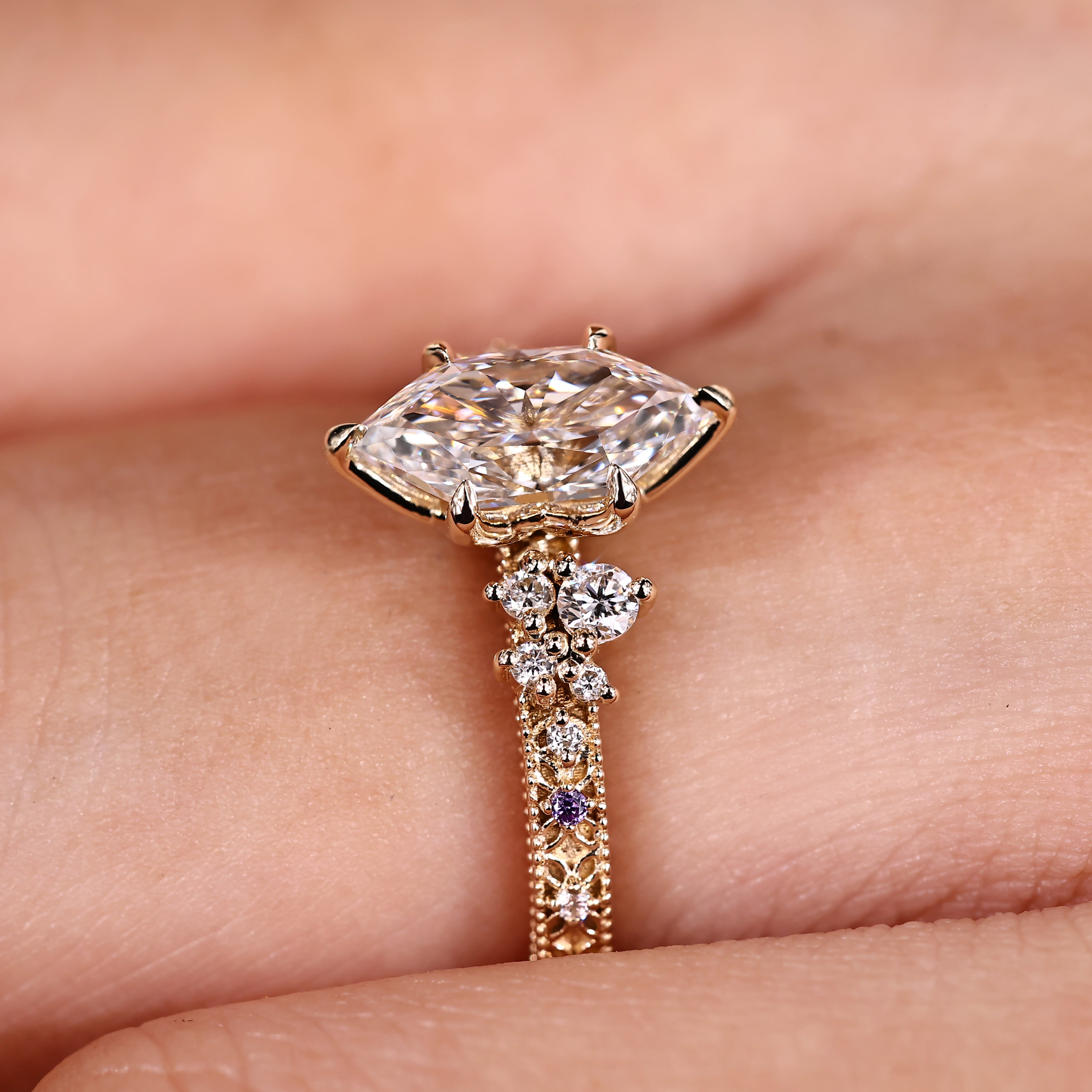 Tulip setting holding dutch marquise center diamond
