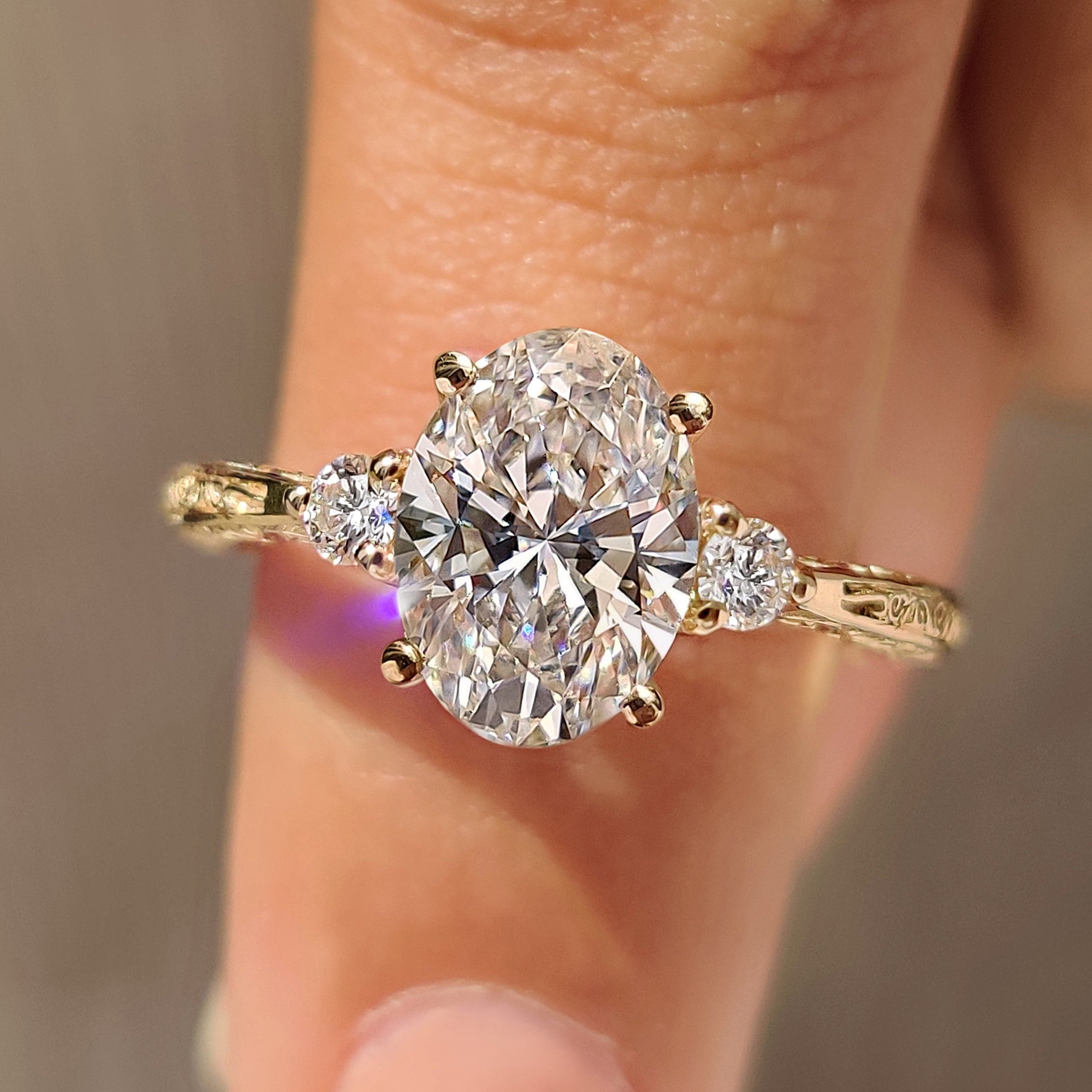 Vintage engagement ring with oval center diamond.
