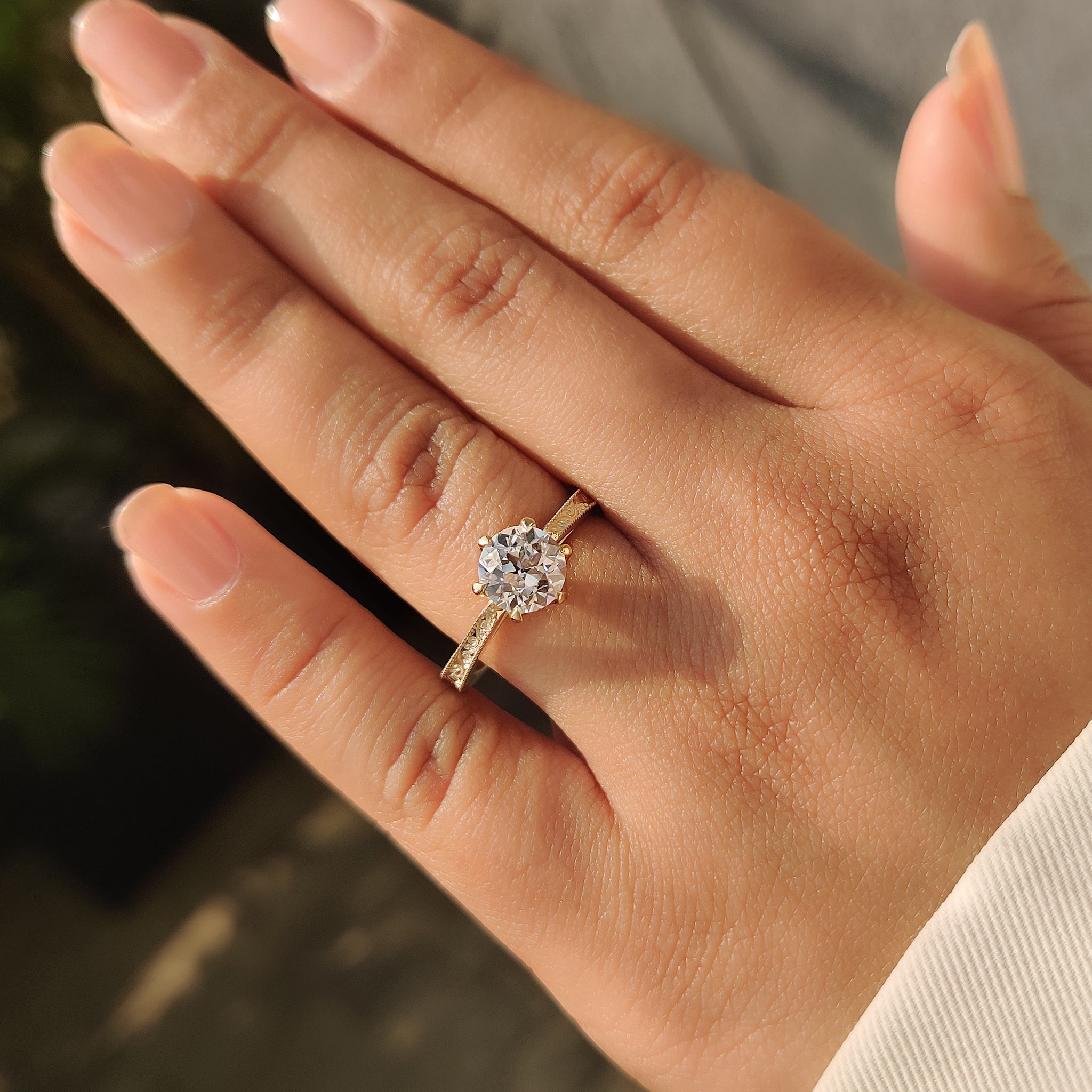 Cathedral setting round diamond ring with art deco look
