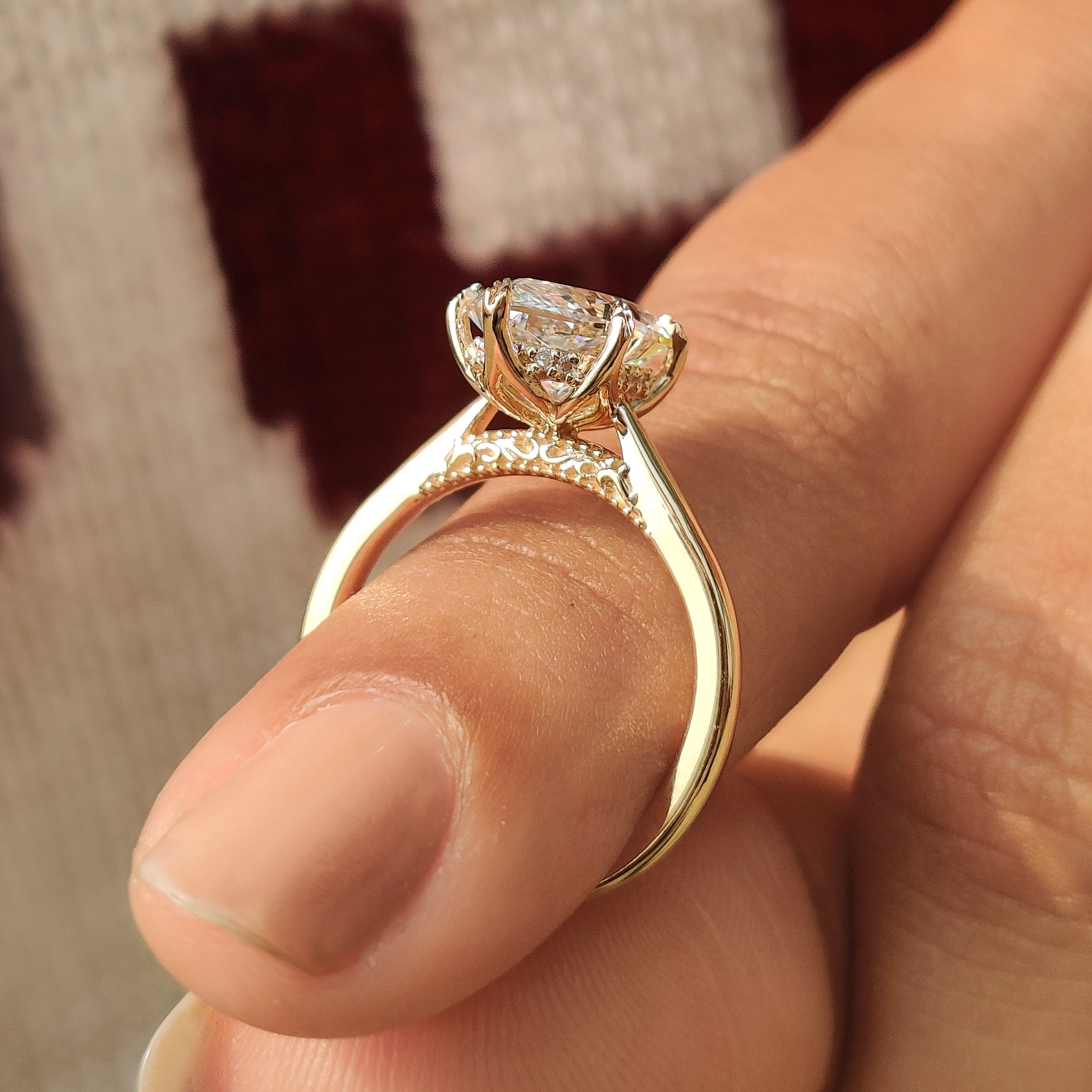 Dutch marquise solitaire ring with six leaf prong design.
