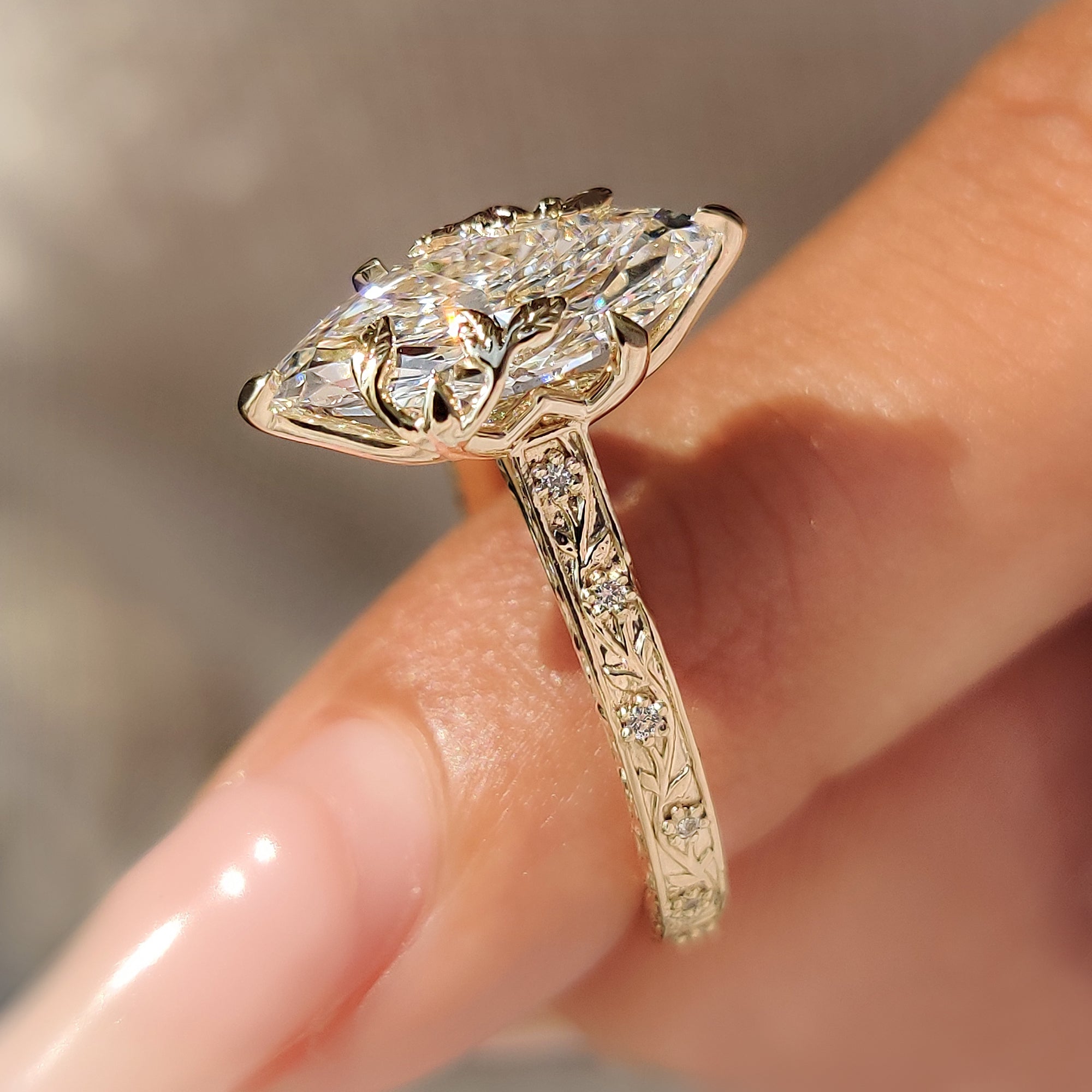 Vintage style engagement ring with marquise diamond.
