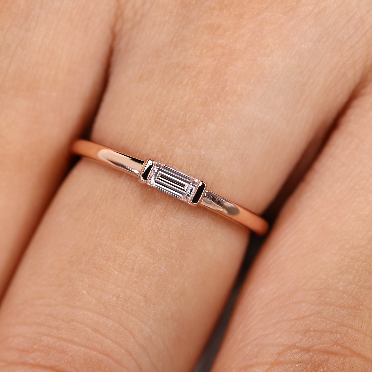 Lab grown diamond wedding band with half bezel design
