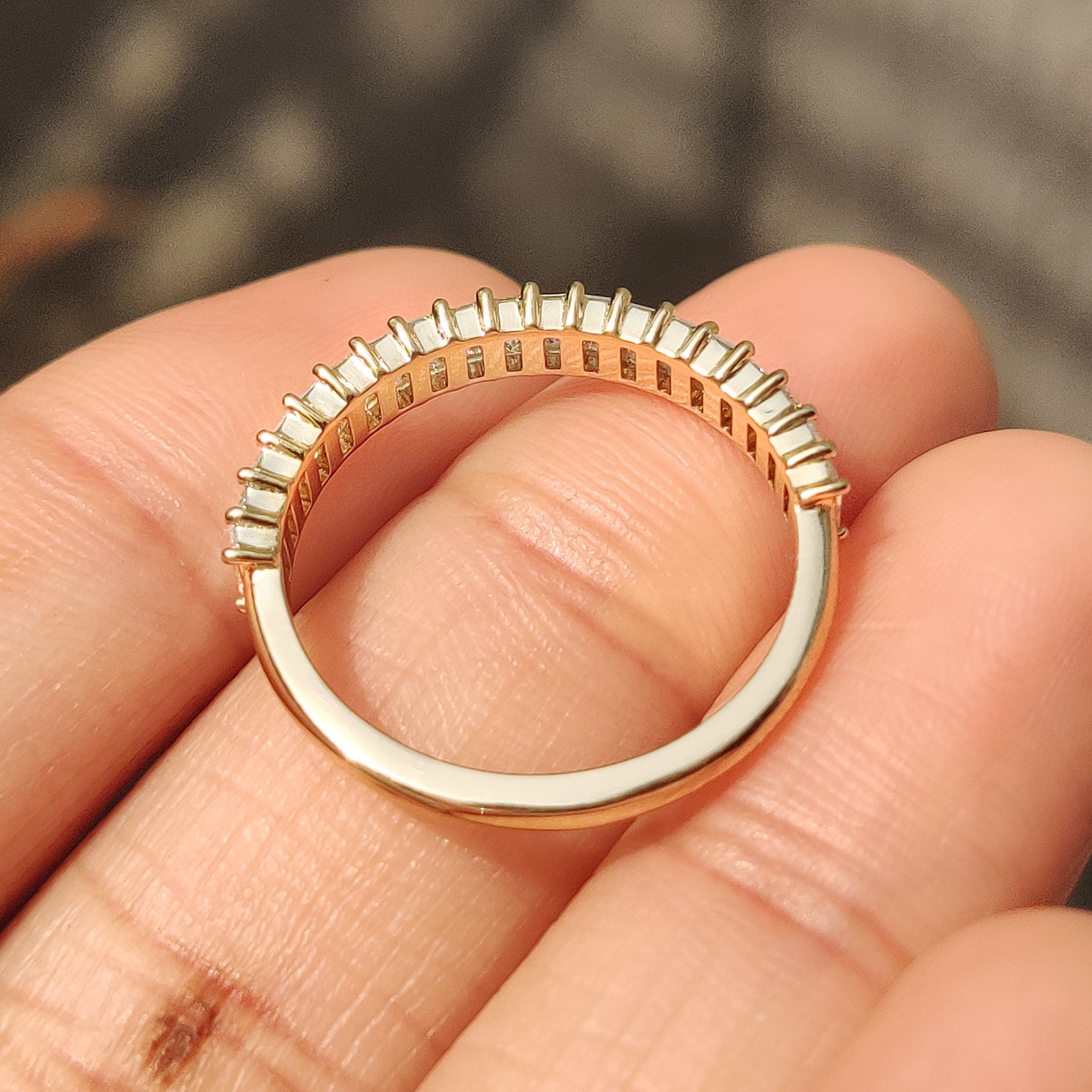 Half eternity baguette diamond wedding band by Carat Diamonds.
