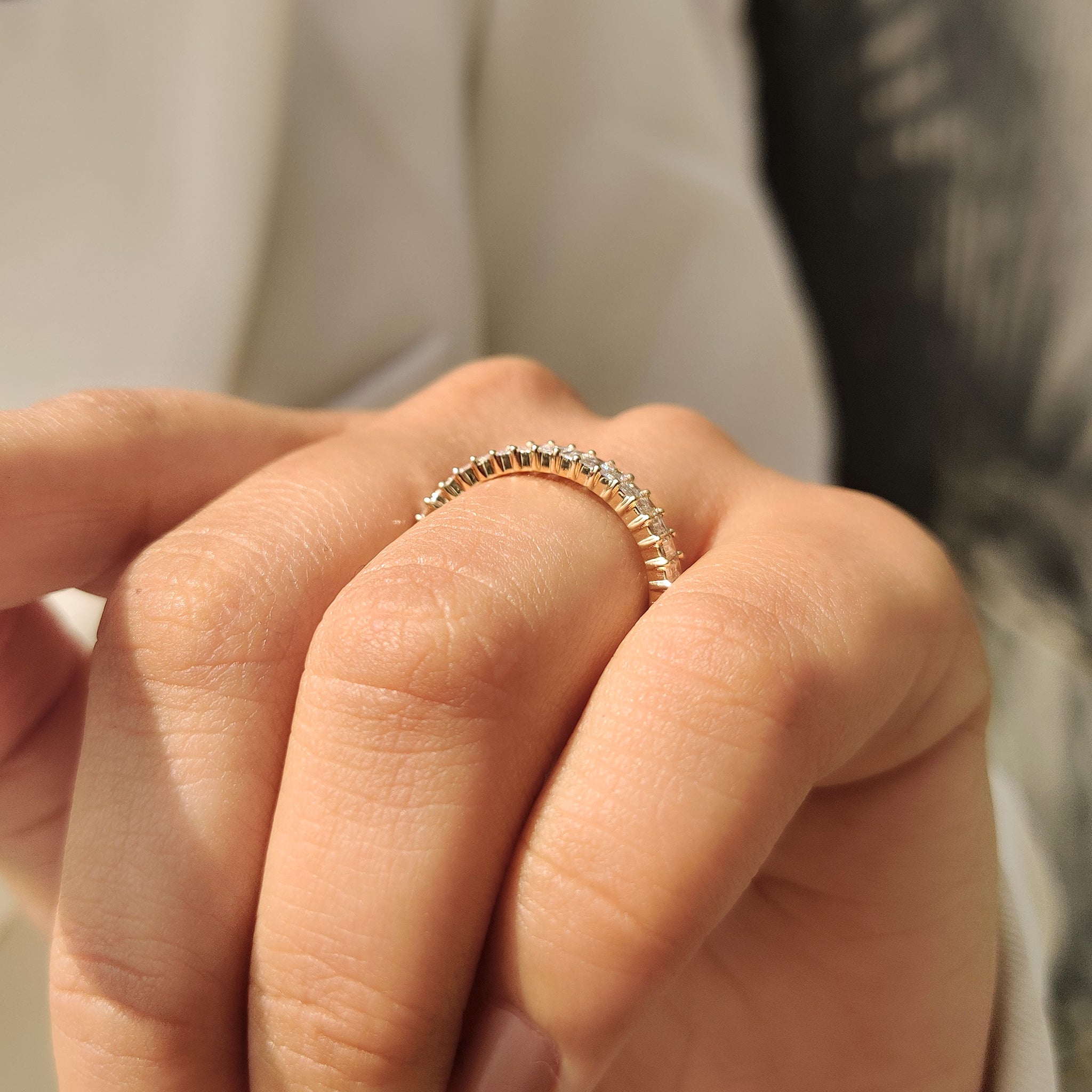 Handmade half eternity baguette diamond wedding band design.
