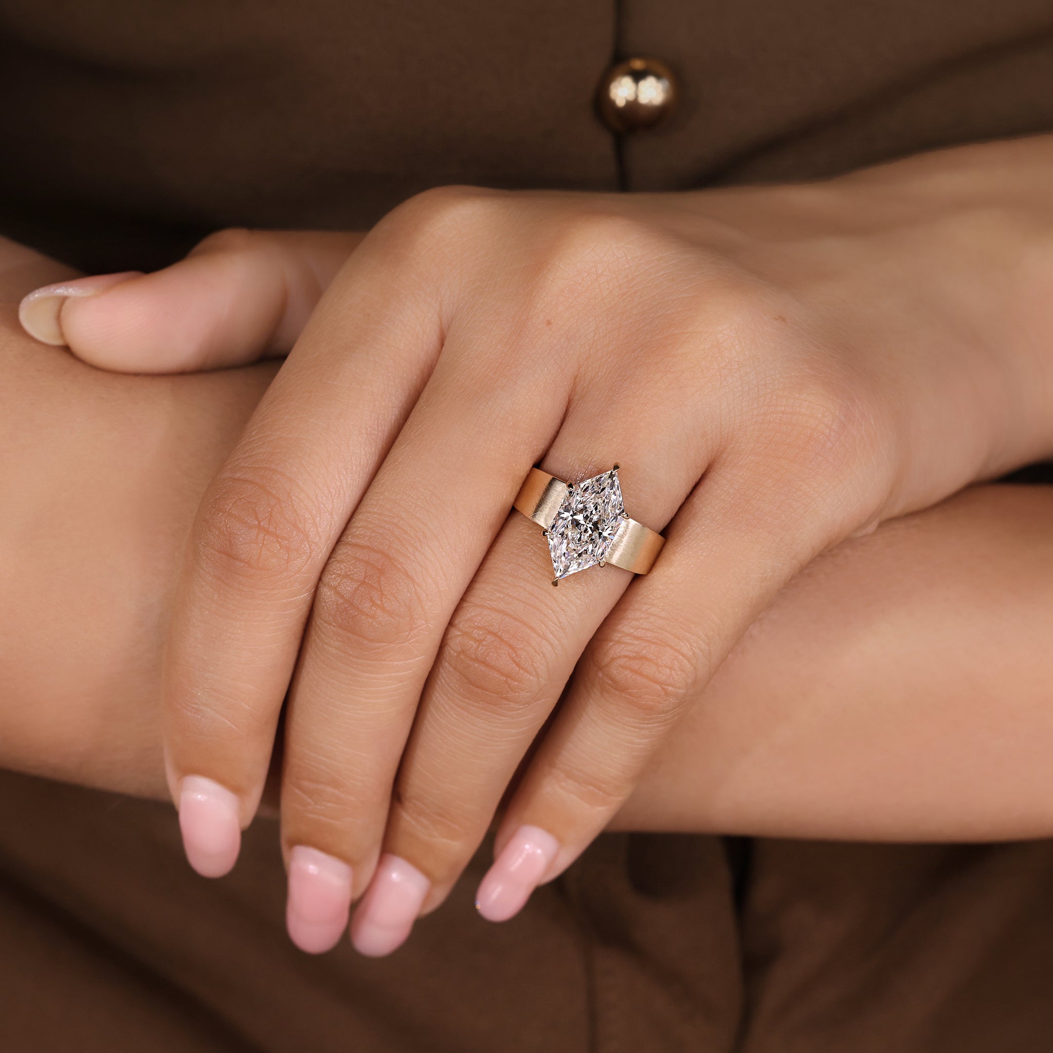 Dutch marquise diamond ring with elegant tapered shank.
