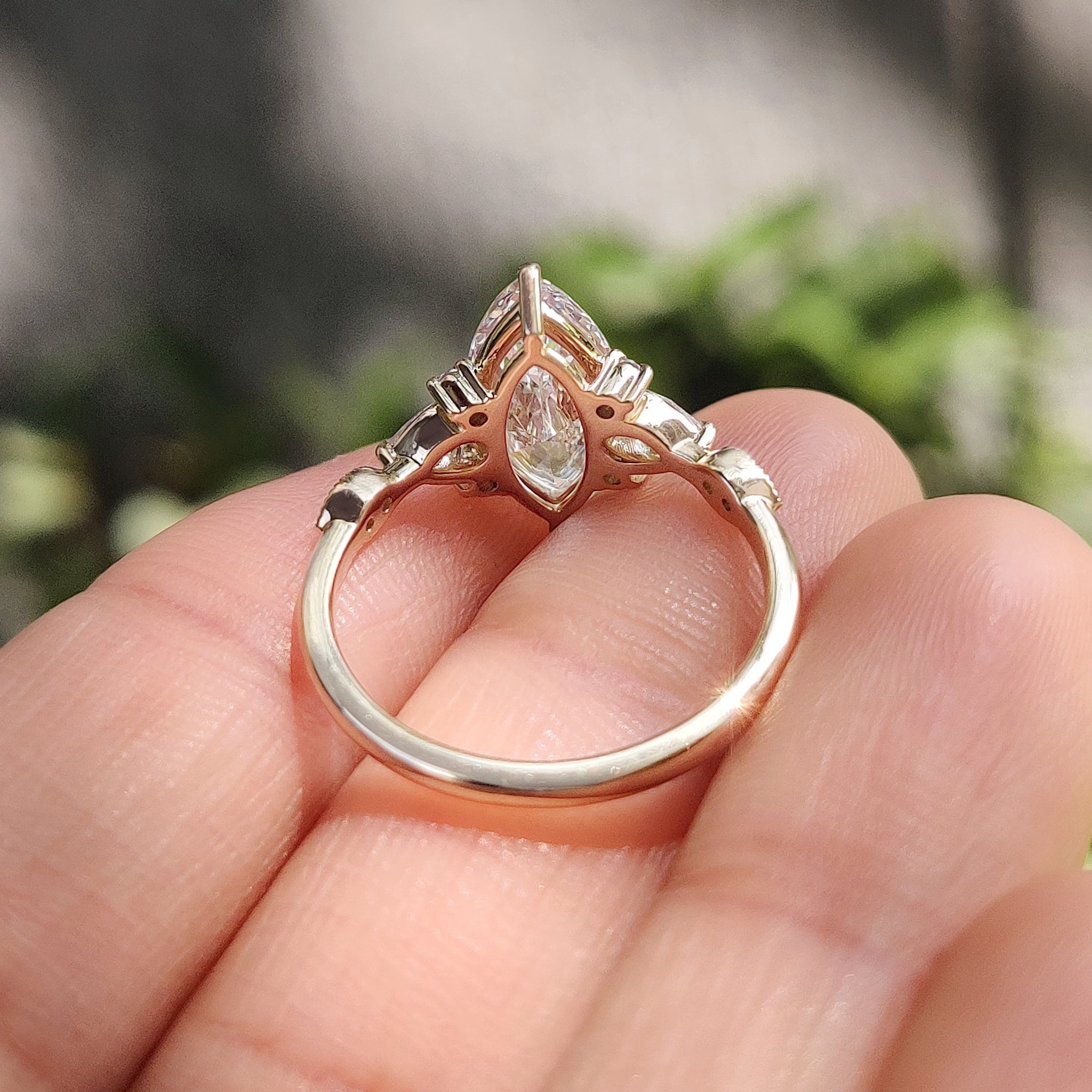 Lab grown marquise ring with two claw prong setting.
