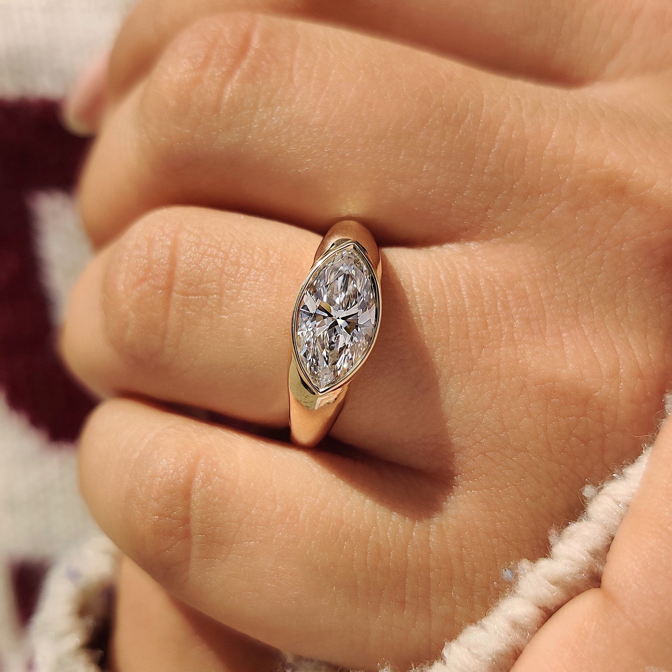 Chunky band ring with marquise center diamond
