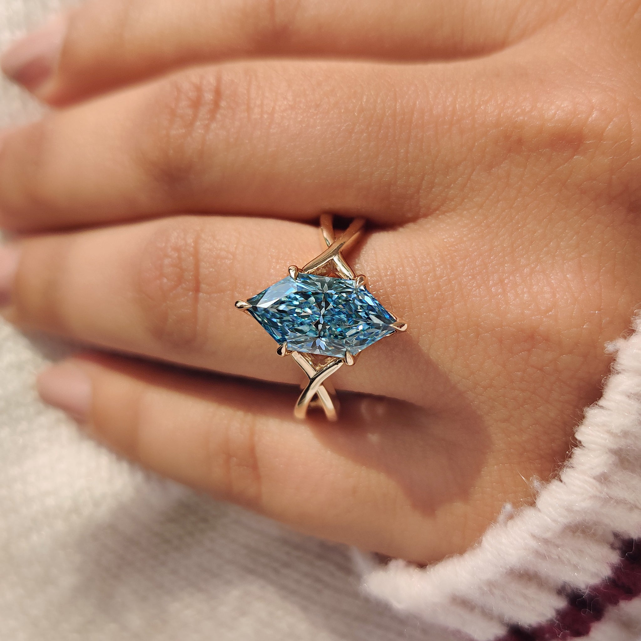 Handmade aquamarine ring with hidden halo and claw prongs
