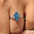 Cathedral setting paired with blue dutch marquise center diamond
