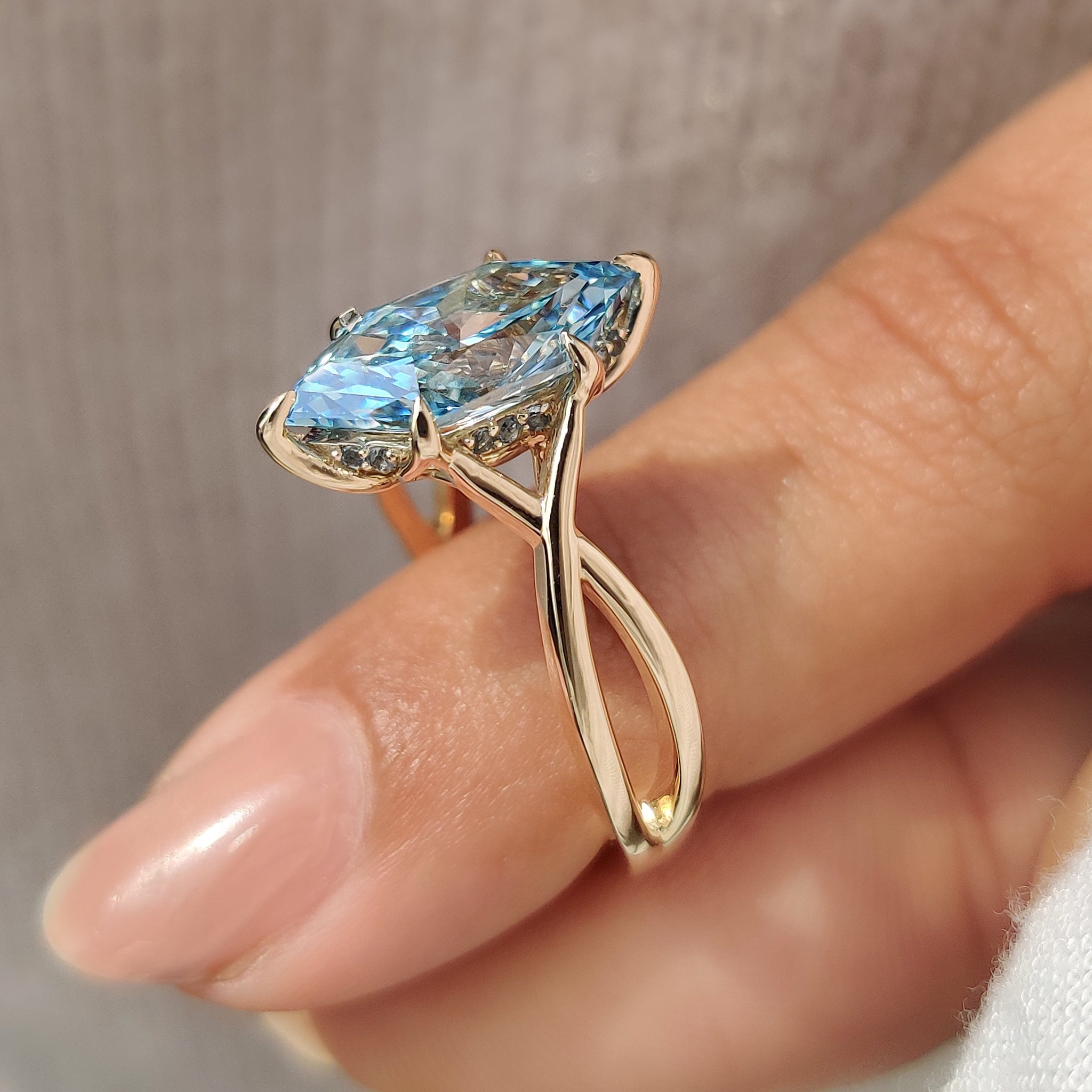Lab grown diamond ring with aquamarine and hidden halo
